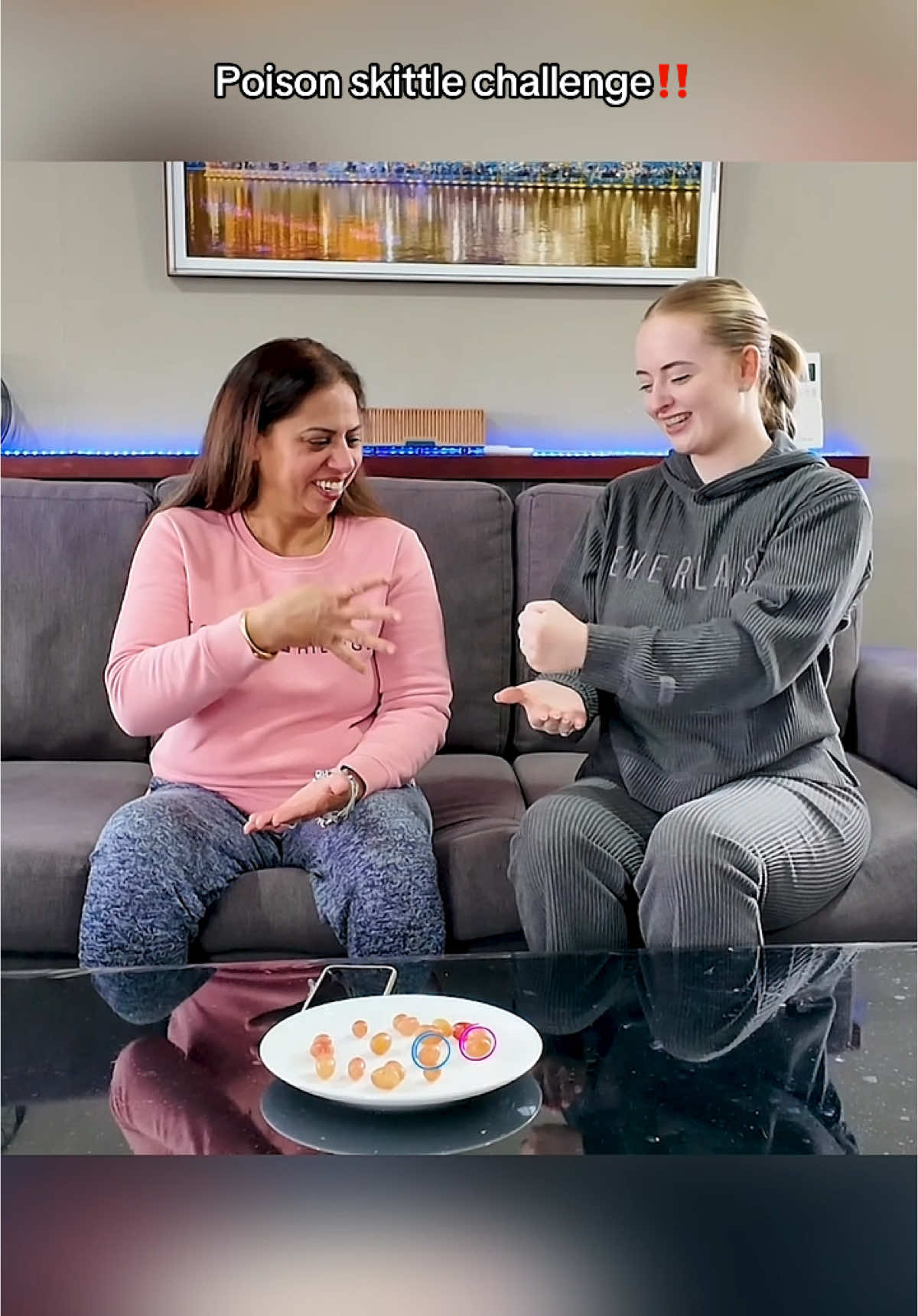 A post by @themodernsinghs on TikTok caption: Poison Skittle Game with My MOTHER IN LAW ‼️ Full vlog on YouTube - THEMODERNSINGHS #trending #game #mum 