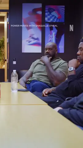 A post by @shaq on TikTok caption: “Power Moves” is coming to @netflix June 4. Following along as I takes on the role of President of Basketball, teaming up with VP Allen Iverson to lead Reebok’s bold comeback. @netflixsports