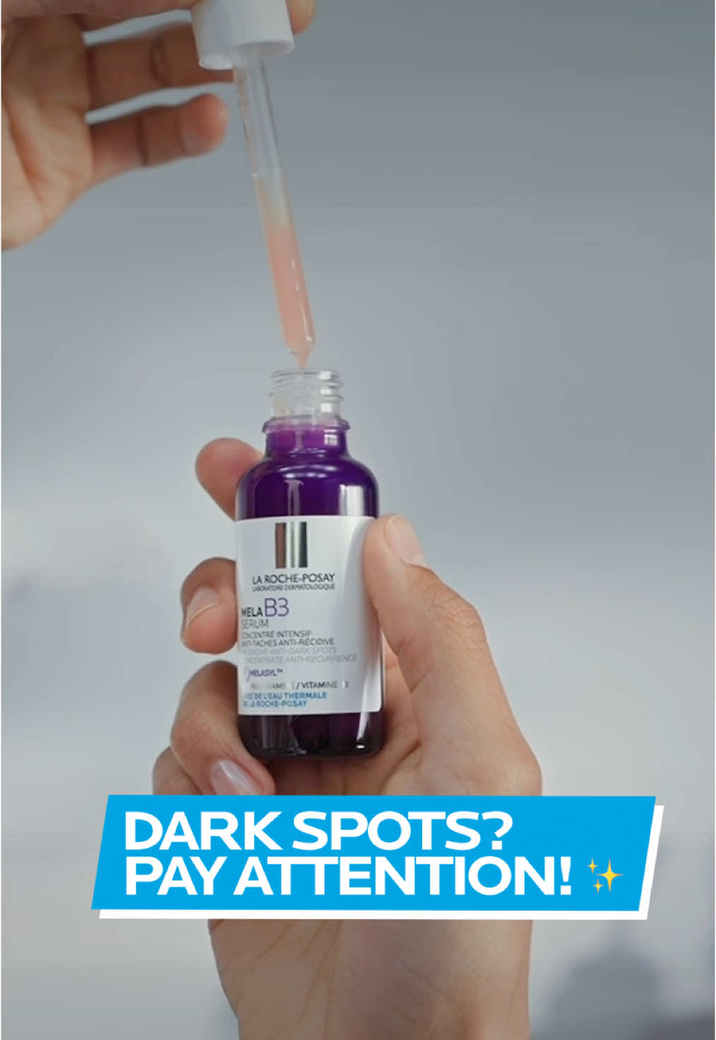 A post by @larocheposay on TikTok caption: Dark spots? Pay attention! ✨  Applying skincare the right way matters. ✨  Here’s how to use Mela B3 Serum and Anthelios Anti-Dark Spots, your ultimate hyperpigmentation duo. 💜 #larocheposay #fyp #bts #skintok 