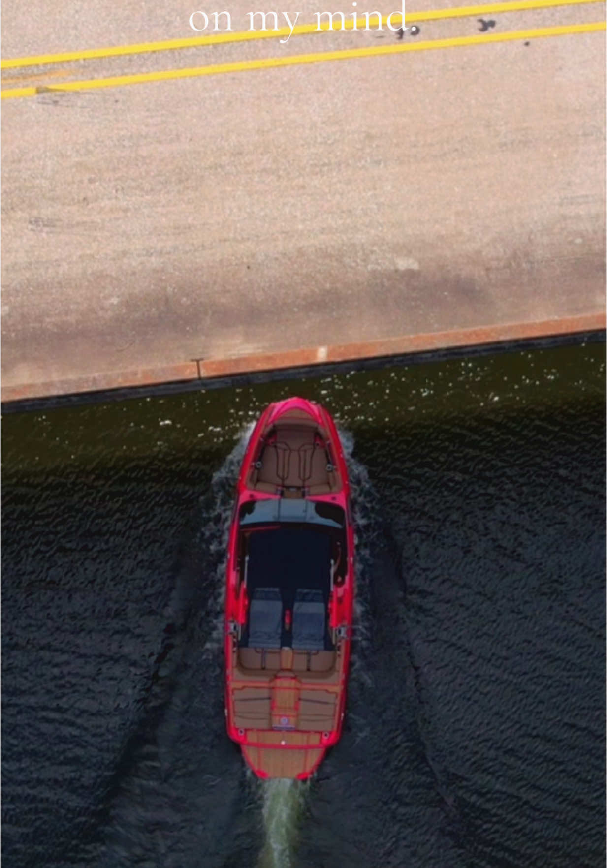 A post by @ on TikTok caption: 🏄🏻‍♂️🤍 #fyp #wakesurfing #lakeday #supraboats #chrisstapleton 