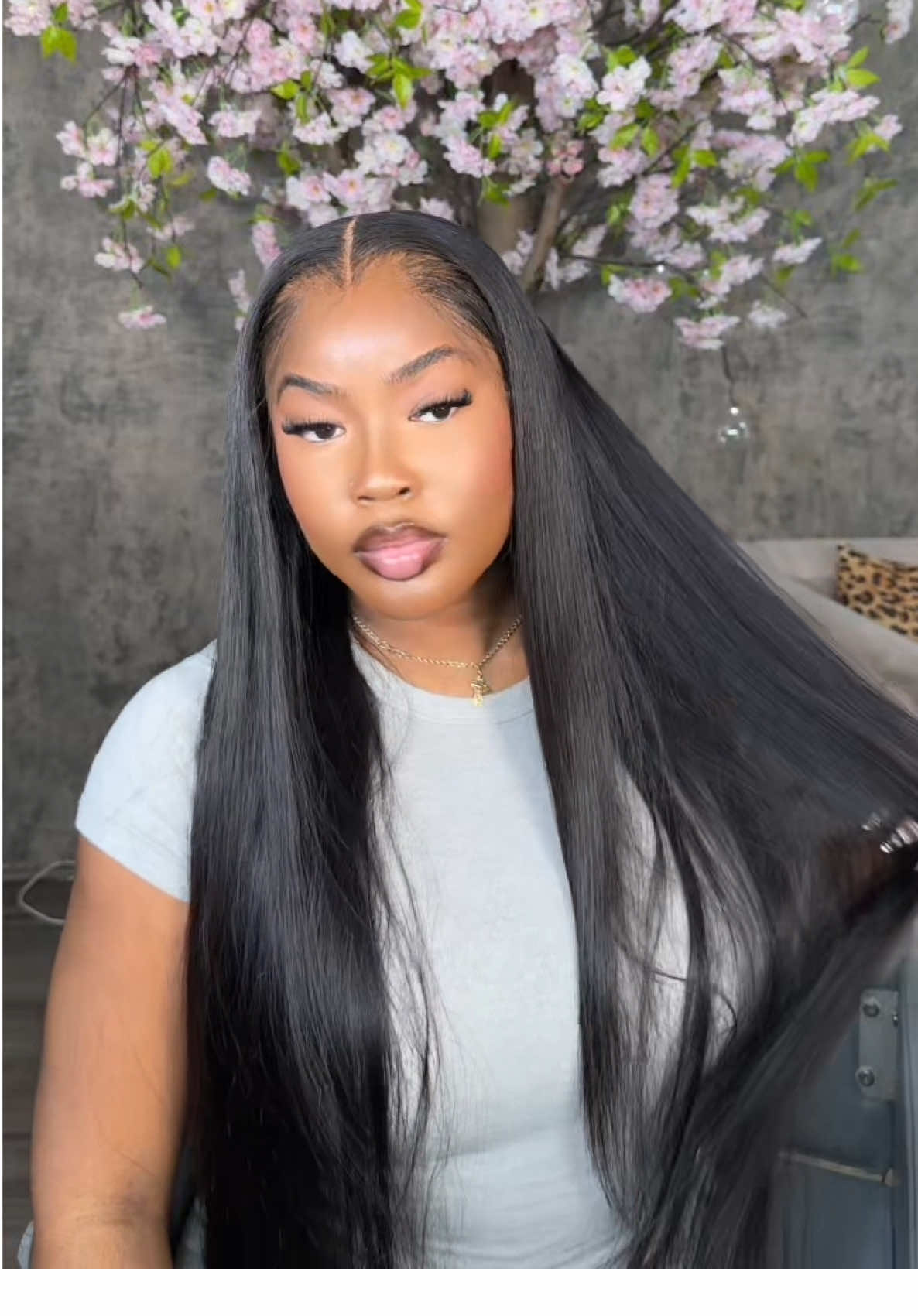 A post by @ on TikTok caption: Time to change my hair style , FT @Viya Hair 30’ Frontal wig 🎀💗 choose the lace frontal length and bundles length/pcs, Viya hair will make it into wig for free,  hair cap has also been upgraded, you can adjust the cap size yourself !! Link in bio 🖇️