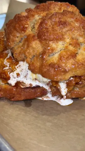A post by @bukutriece on TikTok caption: I was shocked by this Hot honey butter chicken sandwich and gourmet donuts! @DISTRICT | New Orleans 