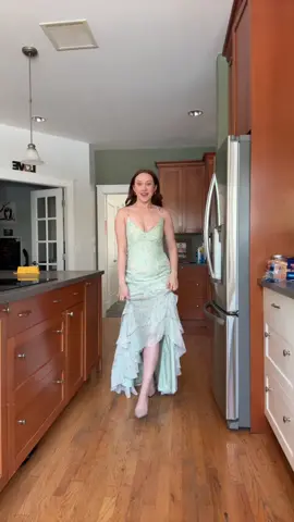 A post by @xobrooklynne on TikTok caption: BEGGING for somewhere to wear this dress from @Azazie // dc @Sam Morris 