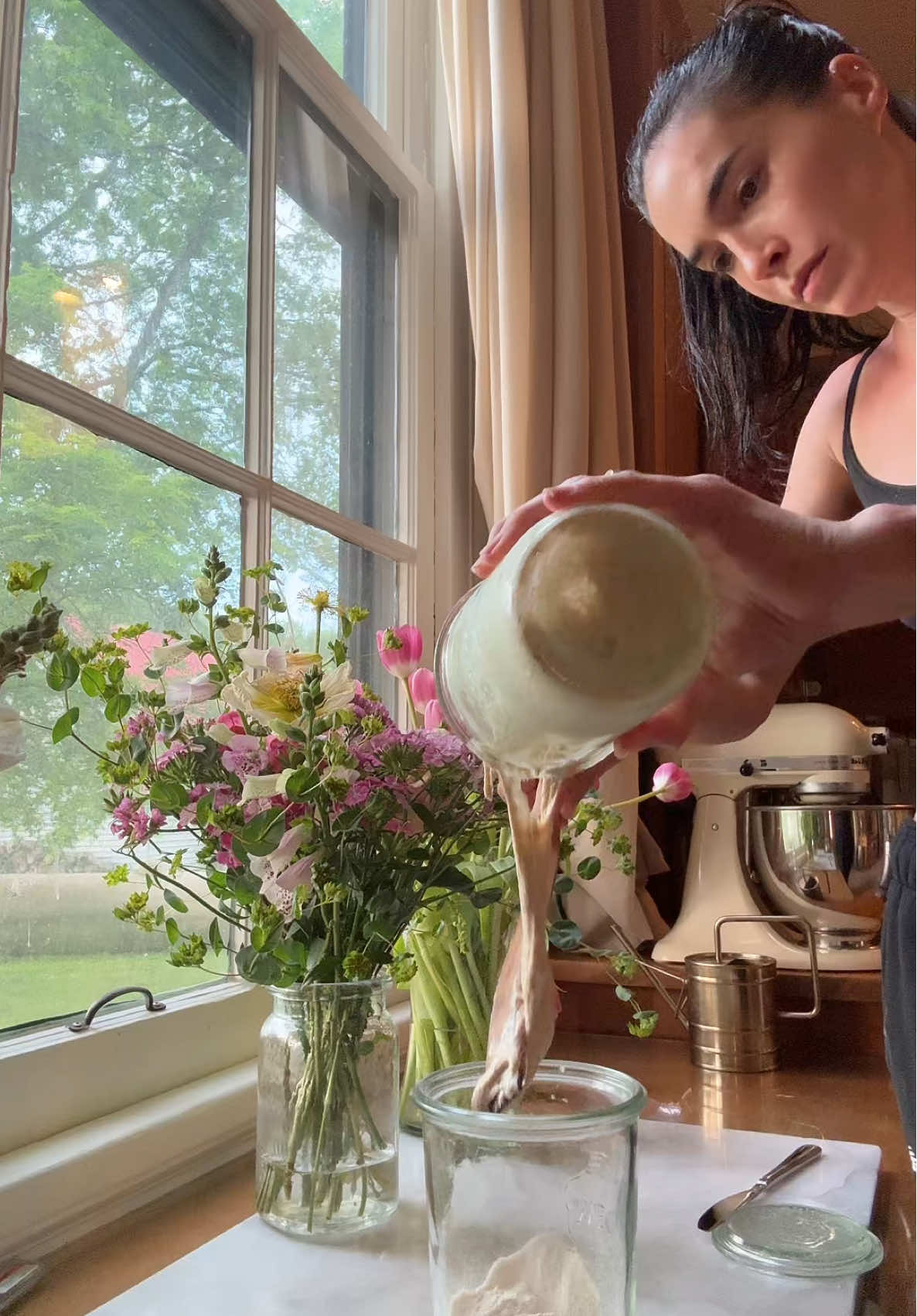 A post by @brittany.xavier on TikTok caption: How to make a loaf of sourdough bread  #sourdough #baking 