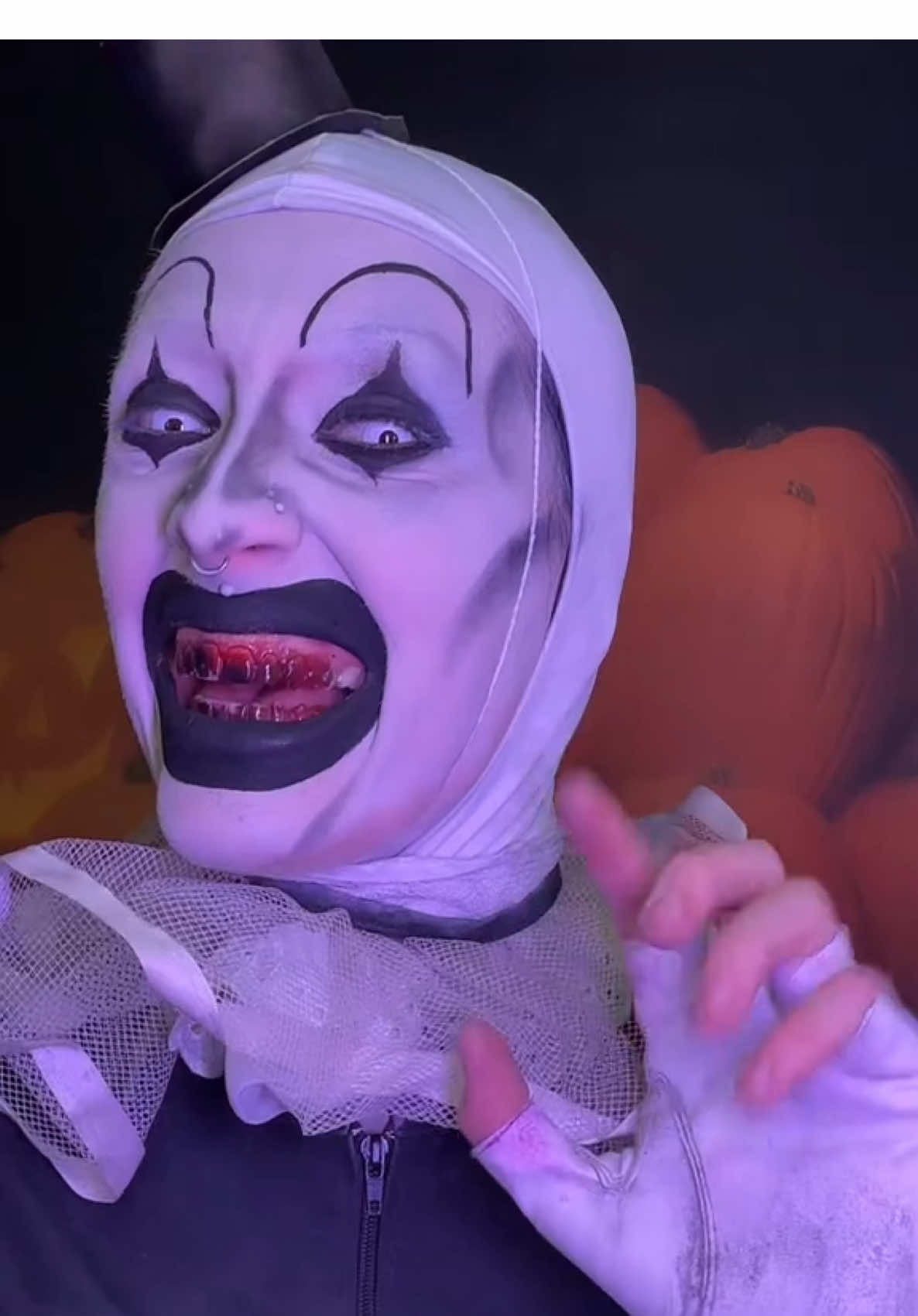 A post by @zombae.undead on TikTok caption: drop on by the clown cafe 🌻 #sfx #horror #terrifier #clown