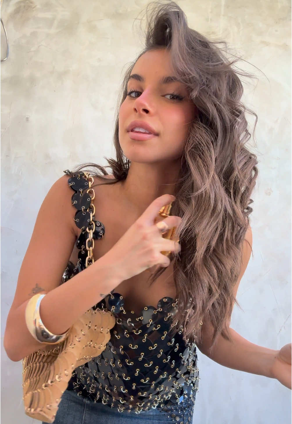 A post by @francescacuccuru on TikTok caption: Smelling like heaven in Ibiza with Million Gold For Her @rabanne #milliongoldforher #milliongoldenresidency #adv