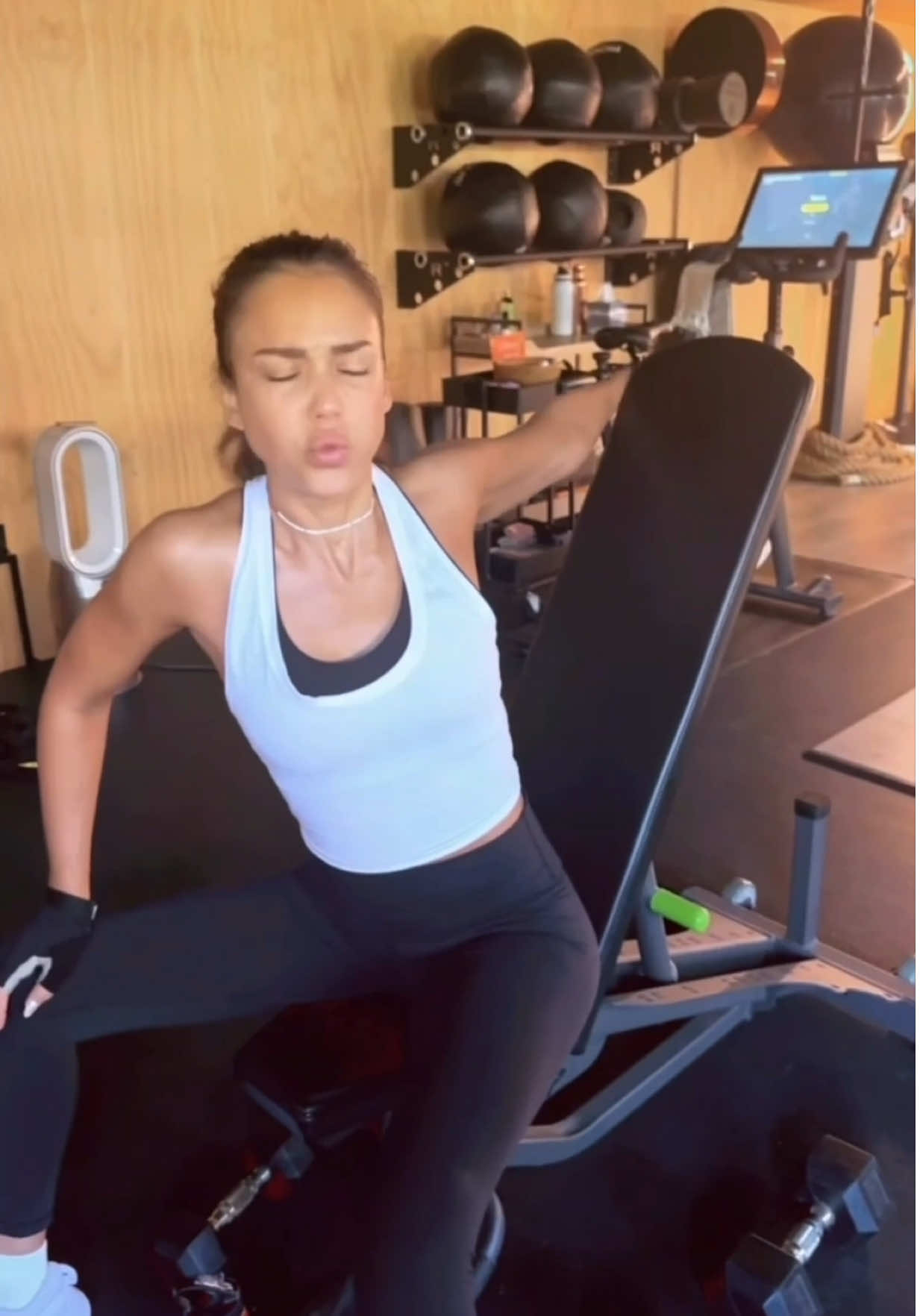 A post by @jessicaalba on TikTok caption: A quick #sweat 💦 #Fitness #Weights #Arms 