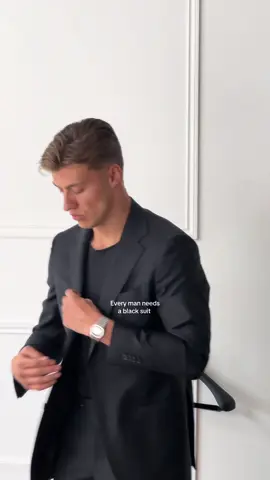 A post by @maxhamilton_ on TikTok caption: Every man needs a black suit 