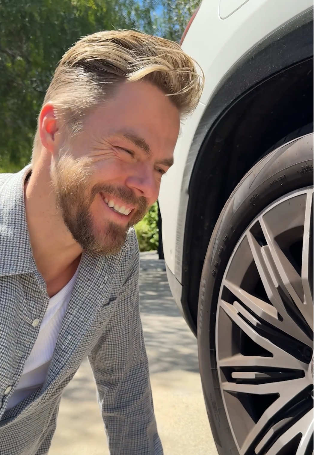 A post by @derekhough on TikTok caption: Can you guess @Hayley Erbert Hough's love language? 