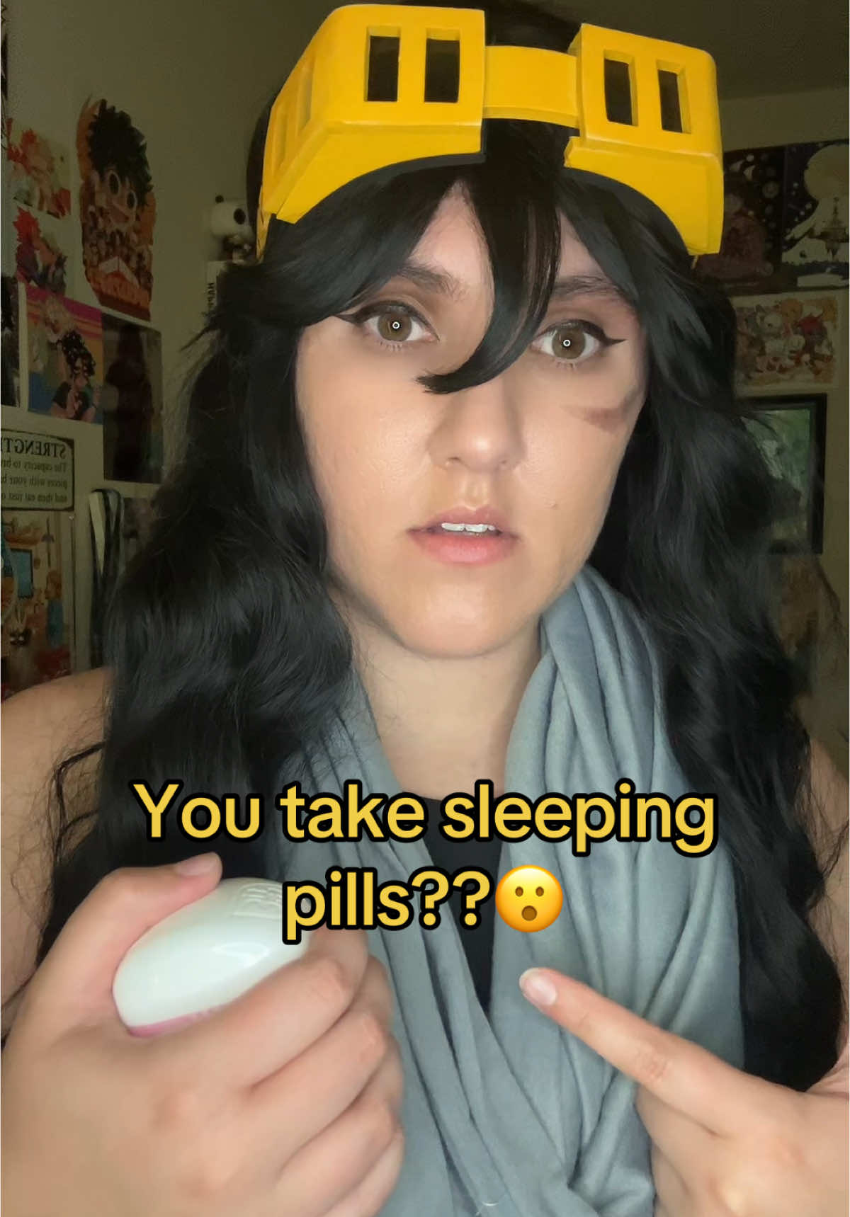 A post by @bigsisofanime on TikTok caption: All Might and Aizawa are in a tricky situation but Aizawa’s got it covered 👍🏼💊😴 #myheroacademia #mha #bnha #aizawa #cosplayer 