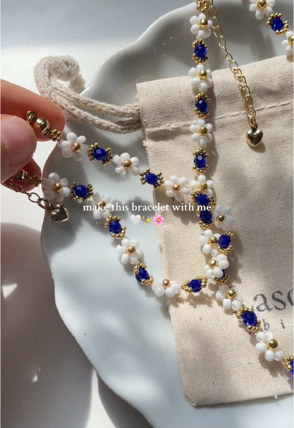 A post by @bijouxlasotita on TikTok caption: Mykonos bracelet >>> ✨🤍💙  #handmadejewelry #canadiansmallbusiness #fyp #beadedbracelets 