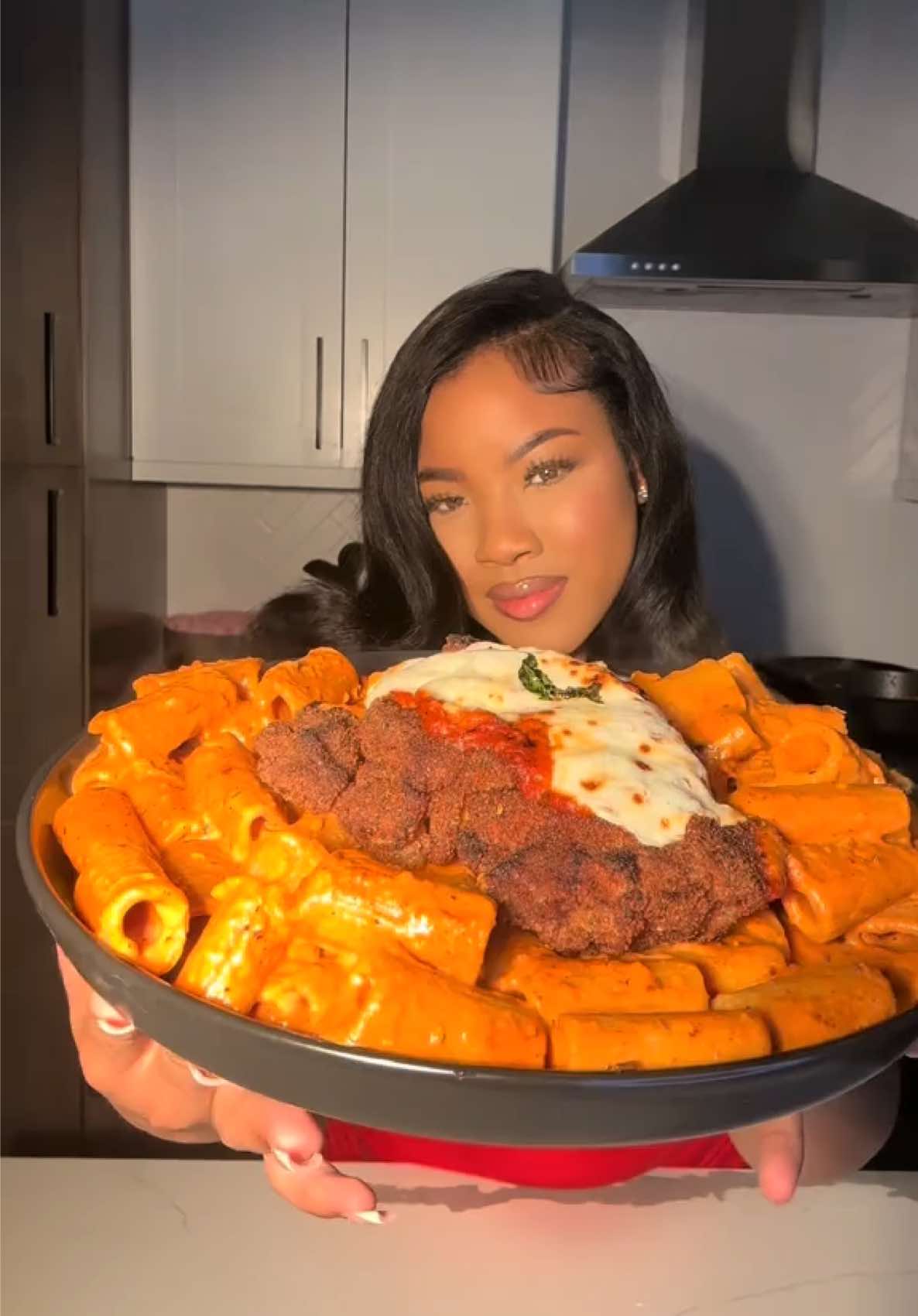 A post by @cookingwithdestiny_ on TikTok caption: Spicy rigatoni pasta w/ chicken parm 🍝