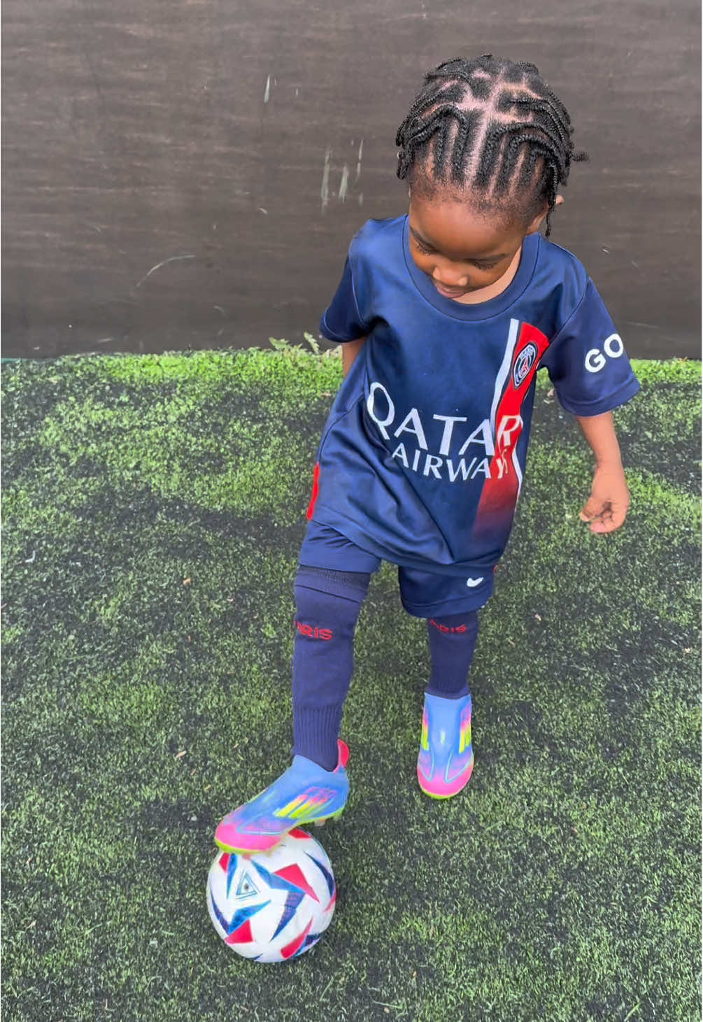 A post by @raisingzion1 on TikTok caption: Behind the scenes of project Doué⚽️🤦🏾‍♂️😂 #toddlertok #toddler #cutetoddler #cute #football #footballtraining #newborn #newbornbaby #funnybaby #funnybabyvideos #funny #funnyvideos #broski #mbappe #doue #psg #championsleague 