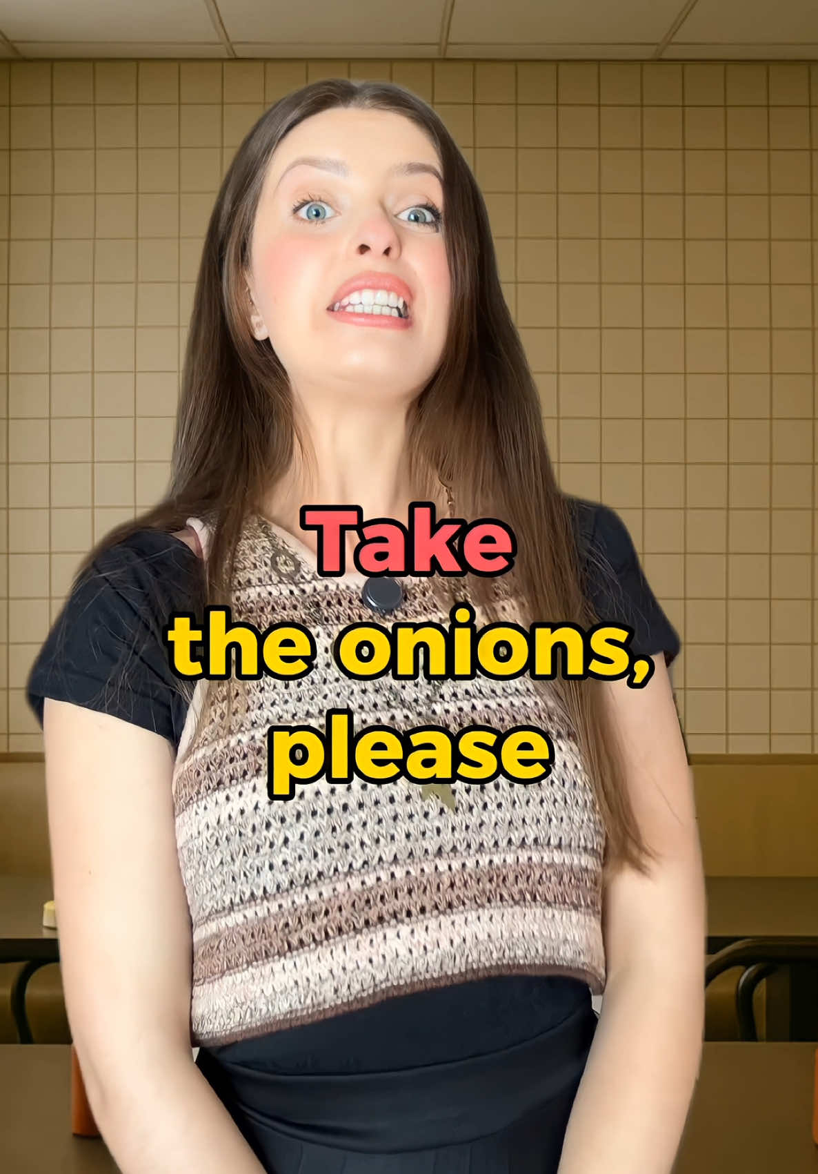 A post by @englishbygiovana on TikTok caption: Ordering a hot dog 🌭 