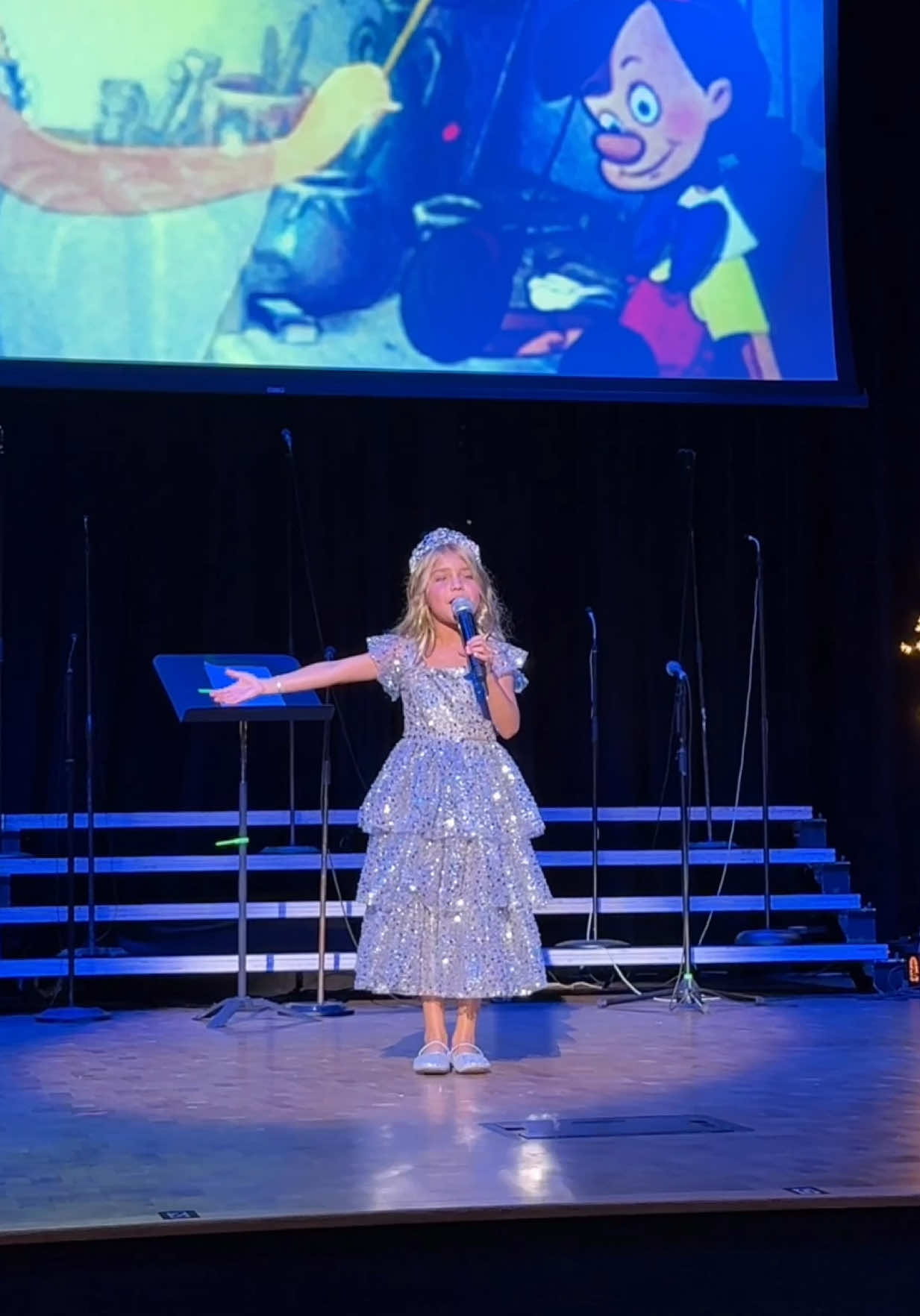 A post by @kylerandmad on TikTok caption: Disney Singing performance 💛 melted my heart 