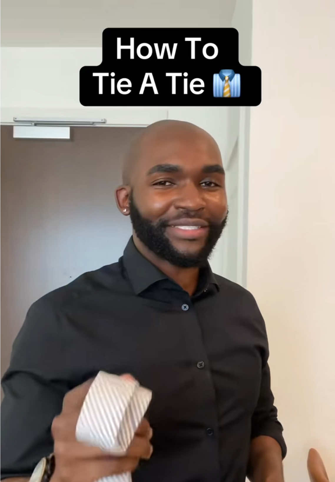 A post by @joshotusanya on TikTok caption: How To Tie A Tie (Simple Method) 👔 Thoughts? 💭 #howtotieatie #ties #tieatie #tutorial #mensfashion #joshosays 