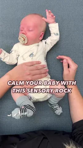 A post by @develobaby on TikTok caption: “The Sensory Rock” is a little trick I’ve used with my own children and now use all the time in my clinic. It’s often super effective for calming a slightly unsettled baby. When you bring your baby’s arms in close to the body, give light weight to the tummy and chest and gently rock the body back and forth, you will often find that your baby calms down. This resembles the feeling of being inside the womb and at the same time offers basic sensory stimulation.  If you want all my baby sleep tricks, including the best practice exercises for sensory stimulation, you will find them all in my bestselling online program “Develobaby - Sleep”.  Go to bio for link.  With love,  Maria ♥️ (Your pediatric physical therapist from Denmark)  . . . . . #babypt #paediatricpt #paediatricot #strongbaby #babyexercises  #babyhack  #newborn #babyexercise #nappychange #sensoryintegration  #momhack #babyplay #motordevelopment  #montessoriparenting #montessori #flathead #babytips #babydevelopment 