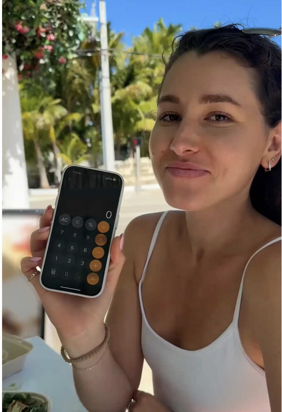 A post by @apple on TikTok caption: @Ally Case reveals the perfect travel hack to convert currency built into the iOS 18 Calculator app. 💱✈️.  Here’s how she does it ⬇️   • Open the Calculator app.  • Tap the calculator icon bottom left and toggle on “Convert.”  • Choose the currencies you want to convert between.  • Enter an amount and get the conversion instantly. Created by @allycase1. Shared by Apple. Music: “Game Love” by @yung d3mz  #AppleMagic #iOS18 #TravelHack #CurrencyConverter #CalculatorApp