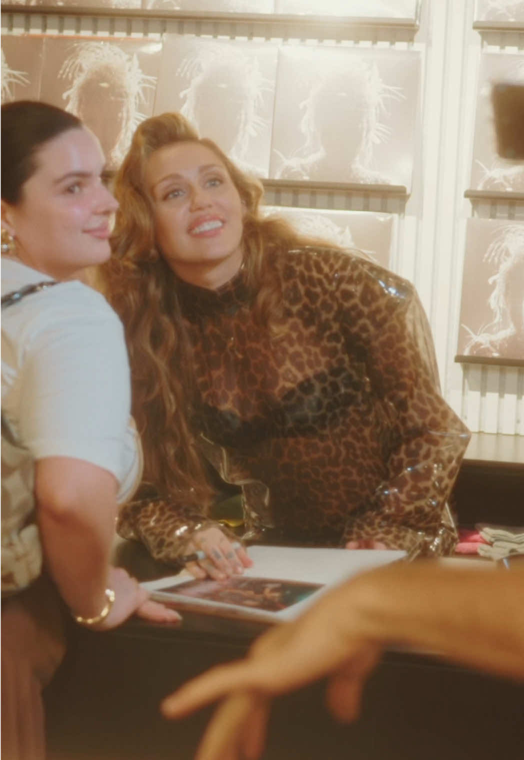 A post by @mileycyrus on TikTok caption: Loved signing vinyls for you in my vinyl. Thank you for showing up to Rough Trade and supporting Something Beautiful.  #MileyCyrusSomethingBeautiful 