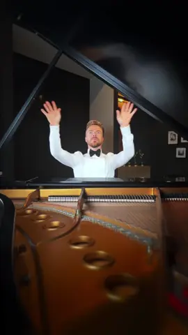 A post by @derekhough on TikTok caption: Who needs just two hands when you can have a whole set of arms? @Urban Theory creating some piano magic!