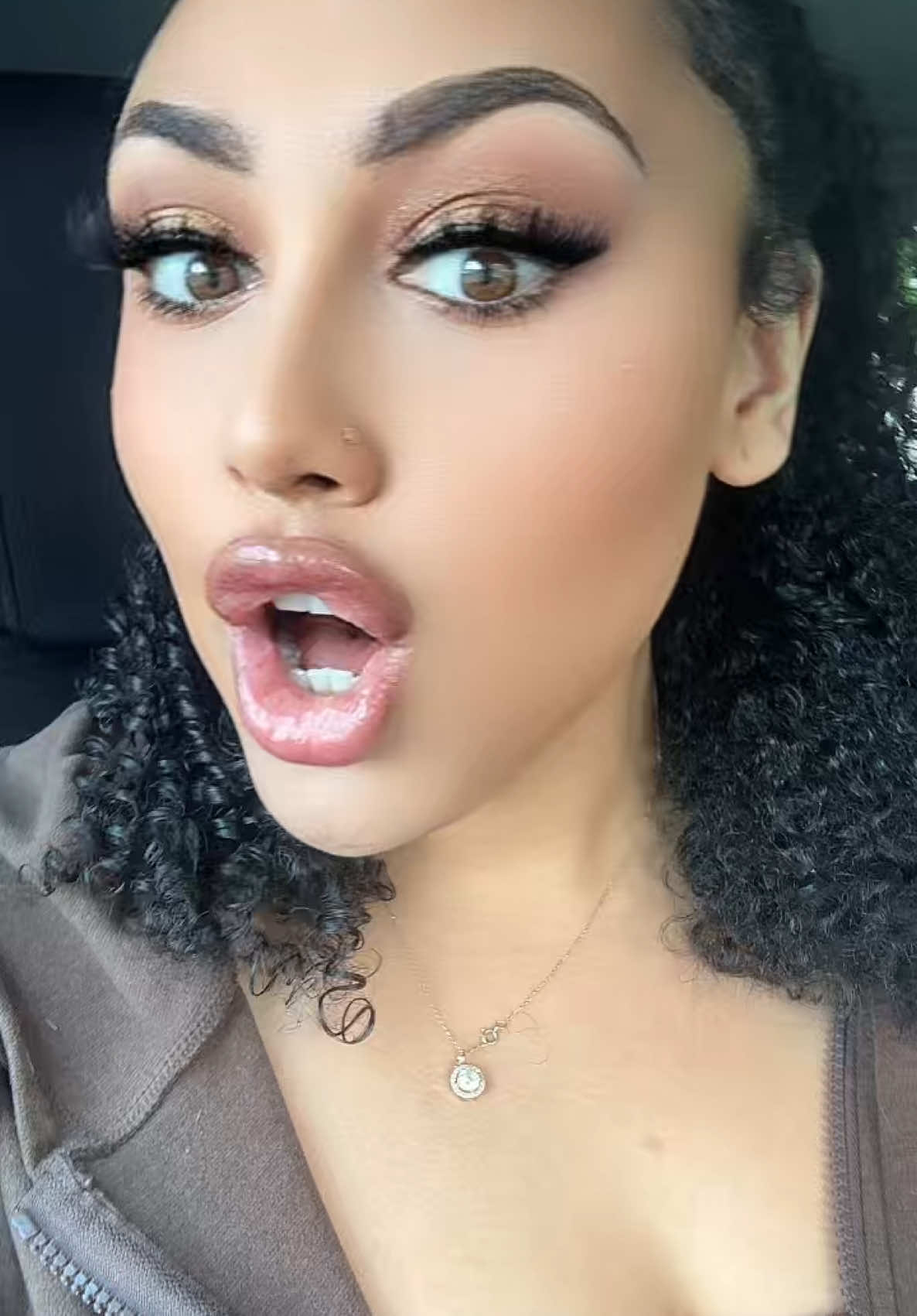 A post by @.tricktales on TikTok caption: #summerhairstyles #curlyhairroutine 