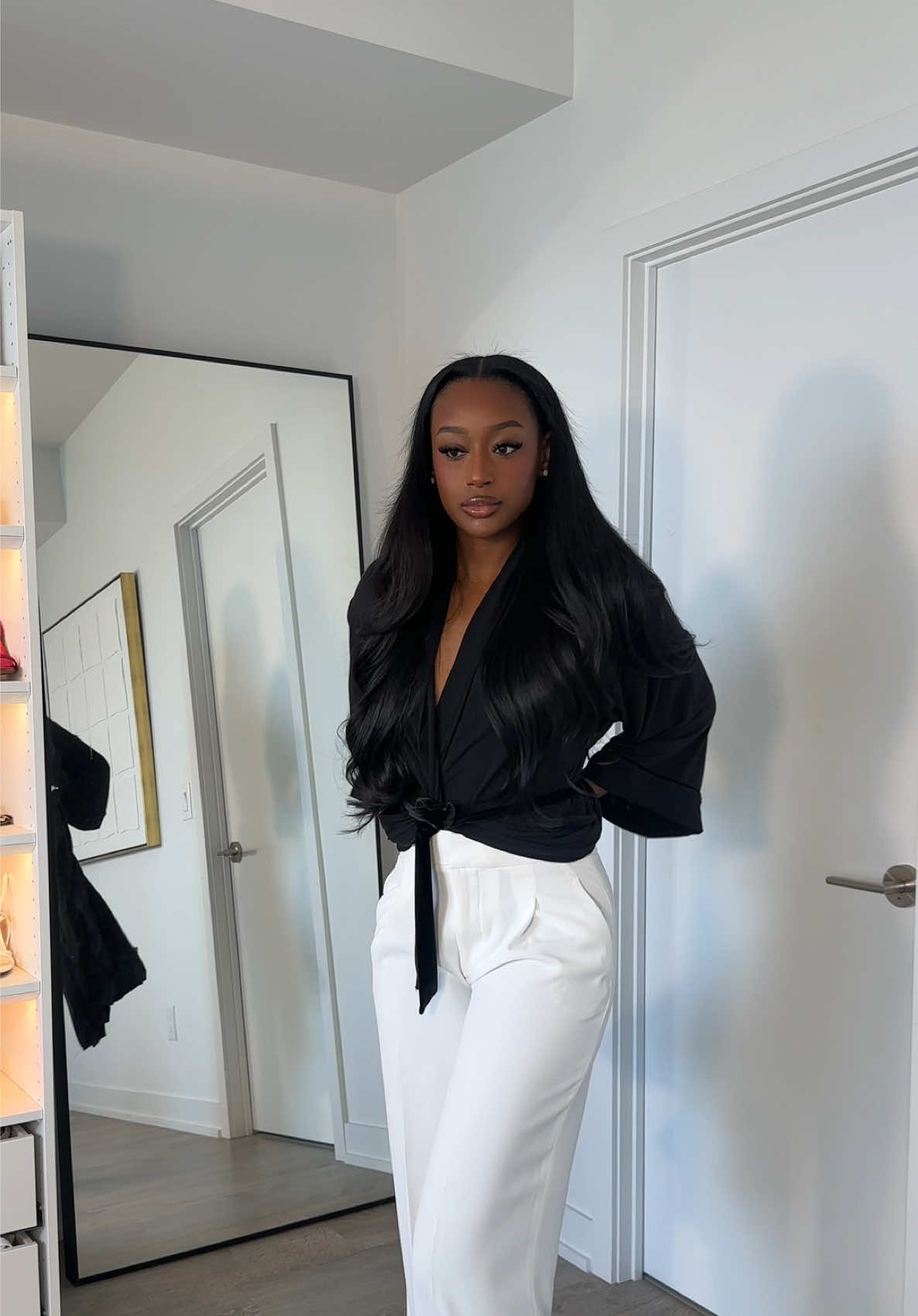 A post by @fatimabahxo on TikTok caption: always dressed like I’m about to clock into a 9-5 and idk I guess that’s my astetikkk @Browns gave me these shoes to wear to their event and the gorg ring is from @OMA THE LABEL 