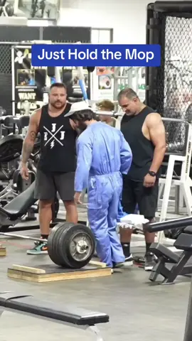 A post by @anatolyprank on TikTok caption: Just hold the Mop  #gym #prank #anatoly 