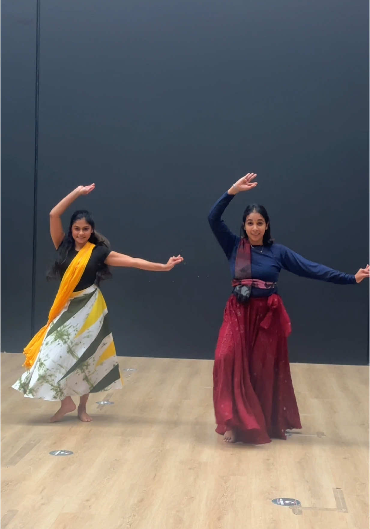 A post by @sachini1107 on TikTok caption: රතුපාට tshirt එක ඇදන් හිටපු නංගි එක්ක නැටුවා @Kaviee Weerasinghe 🫶🏻 . #fyp #bollywithsach 🇦🇺