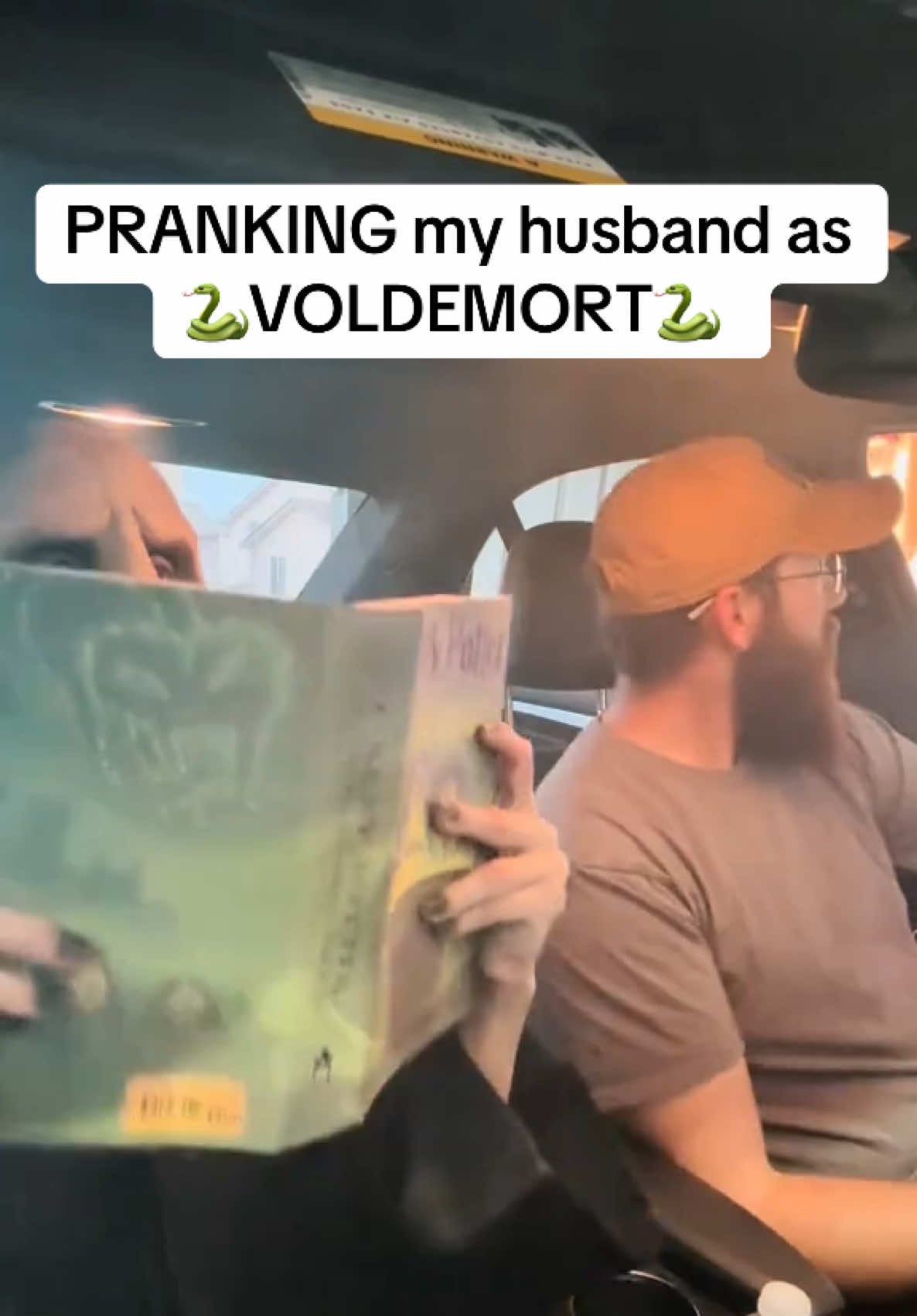 A post by @thugmomog on TikTok caption: PUT YOUR FAITH IN ME! 😂🐍 #couples #husbandwife #prank #fyp #marriage #sfxmakeup #husbandwife #trending #couplecomedy #blowthisup #harrypotter #voldemort #hogwarts #cosplay 