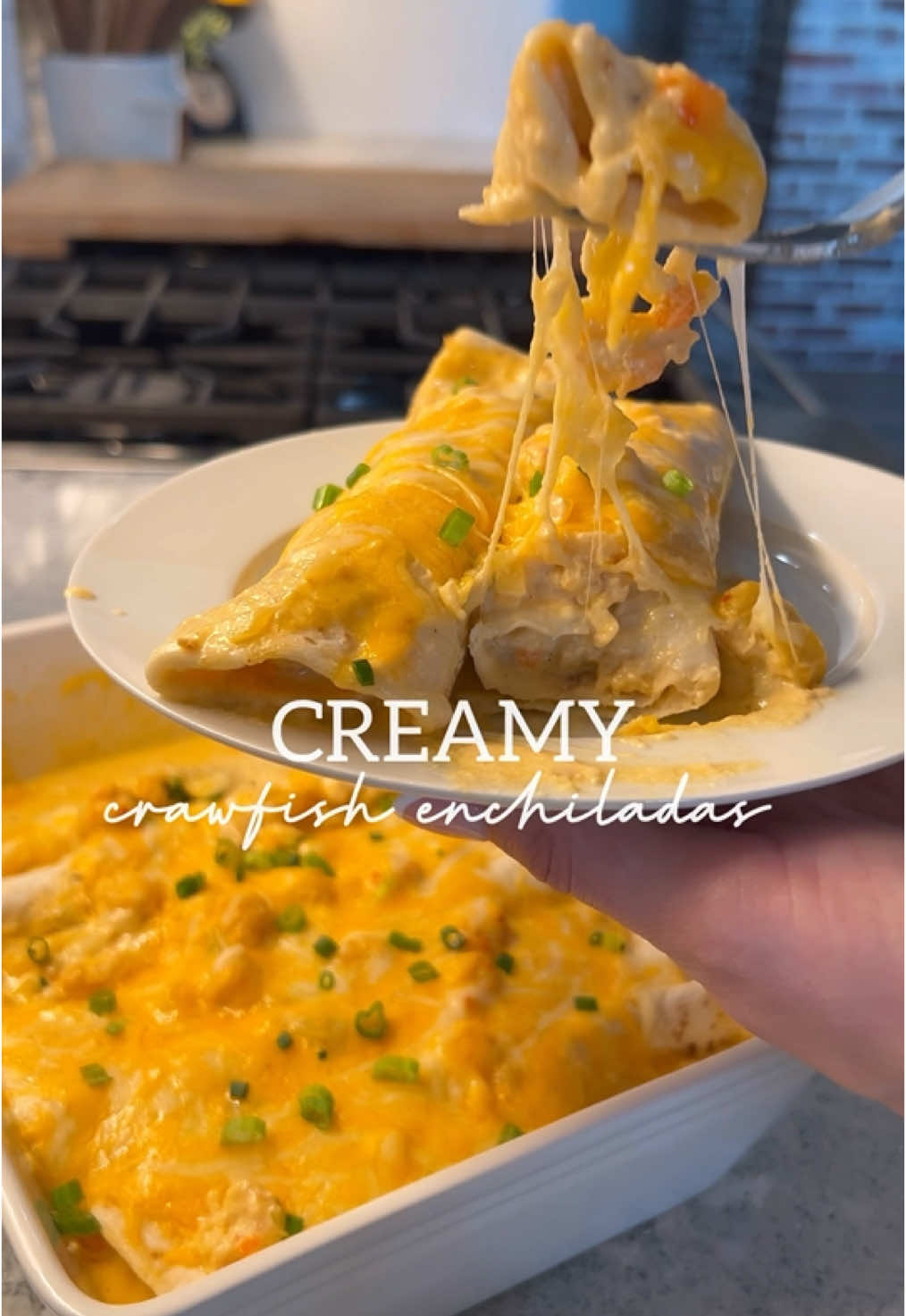 A post by @britscookin on TikTok caption: Crawfish Enchiladas 🦞✨ What you need: 	•	1.5–2 lbs crawfish tails 	•	1 small onion, diced 	•	1/2 red bell pepper, diced 	•	4 tbsp butter 	•	1 tsp Britscookin Cajun seasoning 	•	1 tsp Britscookin Garlic & Herb seasoning 	•	1 tbsp minced garlic 	•	2 cups heavy whipping cream 	•	4 oz chopped green chilies 	•	3/4 cup sour cream 	•	3 cups Monterey/Colby Jack cheese, shredded 	•	8–10 fajita tortillas How to make it: 	1.	Melt butter in a skillet and add onions, bell pepper, and seasonings. Cook until onions are translucent. Add garlic and cook for 2 more minutes. 	2.	Pour in heavy whipping cream and chopped green chilies. Let simmer for 10 minutes. 	3.	Add sour cream and 2 cups of cheese. Cook for 5 minutes, then stir in crawfish tails. Simmer for 10 more minutes. Season to taste. 	4.	Spoon some of the crawfish sauce into a baking dish. Warm tortillas, then fill each with a bit of the crawfish sauce. Roll and place seam side down in the dish. Pour remaining sauce over the top and sprinkle with remaining cheese. 	5.	Bake at 350°F for 5–10 minutes or until cheese is melted. Top with green onions if you’d like. #easyrecipe #yum #creatorsearchinsights 