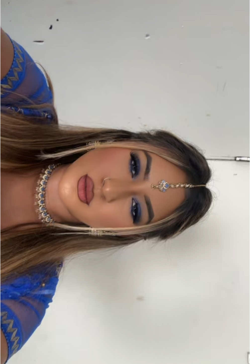 A post by @tanyabegum04 on TikTok caption: Wind messed up my hair🥲#tanyabegum04 #foryoupagе #bengaligirl #eidmubarak #you #lloyd 