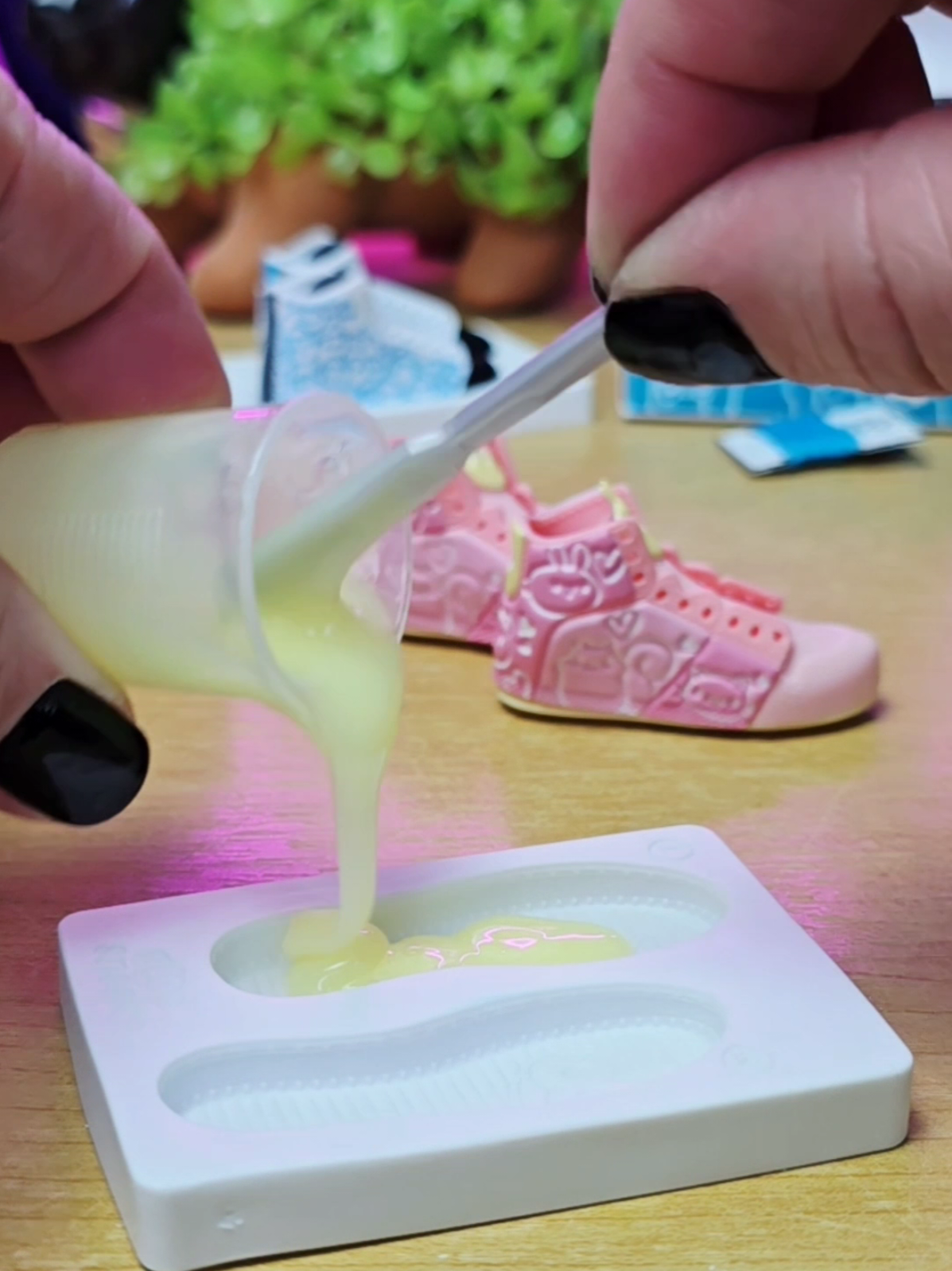 A post by @asmrplayroom on TikTok caption: Making Custom Sneakers with Miniverse Make it Mini Sneakers  #asmr #sneakerhead #miniverse #mga #sneakers #makeitmini 