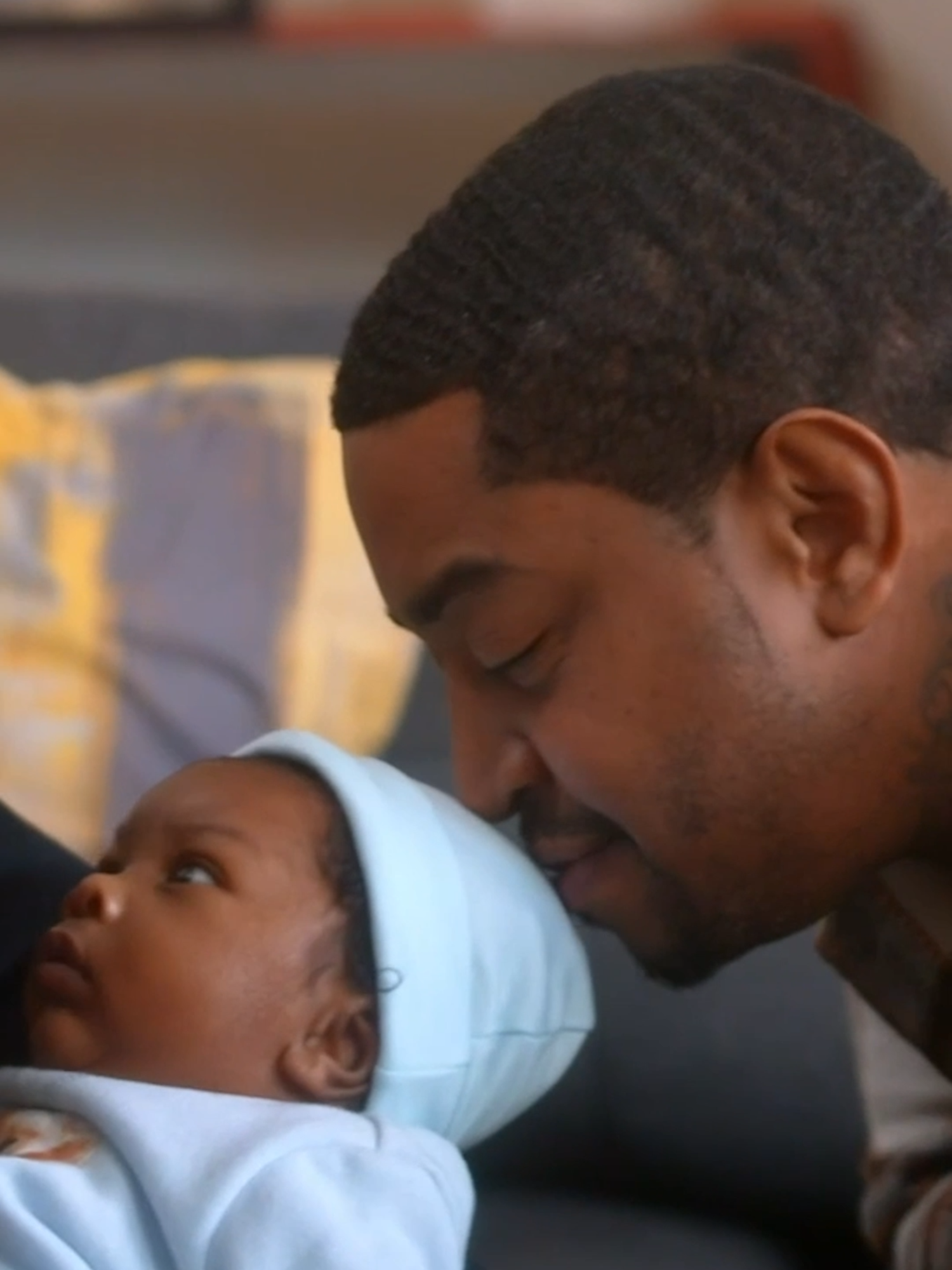 A post by @loveandhiphop on TikTok caption: #MommaDee meets #Scrappy's new son 🥹 #lhhatl #loveandhiphop #realitytv #lol #grandma #baby #newborn #adorable #lilscrappy