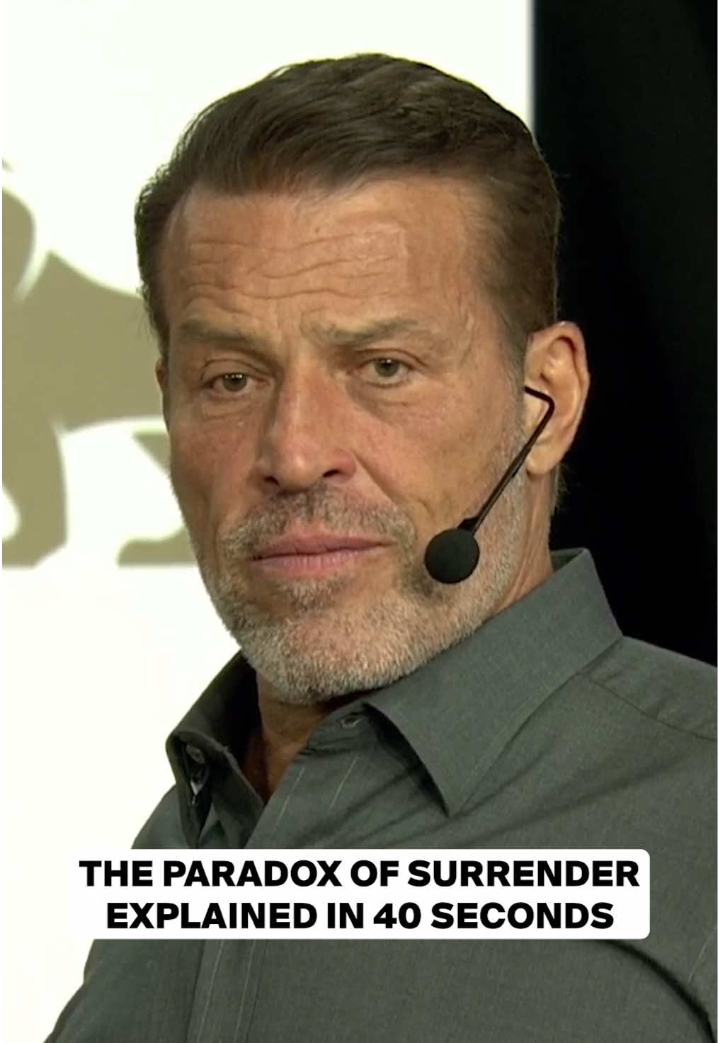 A post by @tonyrobbins on TikTok caption: How Surrendering Gives You Strength #motivation #mindset #growth #quote #real 