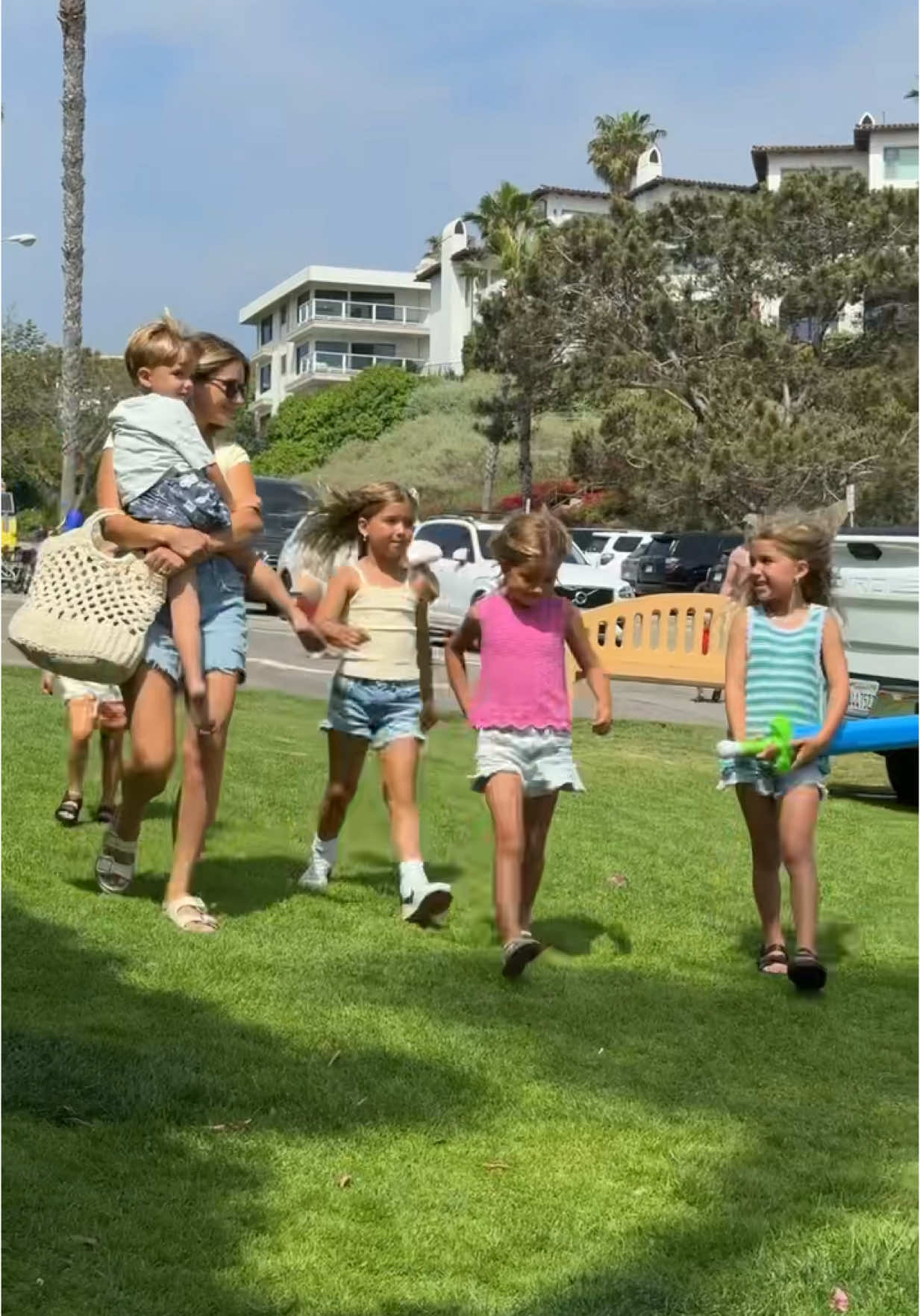 A post by @kylerandmad on TikTok caption: Getting 5 kids to the beach? Not easy. But @Banana Boat  Kids 360 Coverage Sunscreen Mist makes it so much easier! #BananaBoatPartner #ProtectTheFun ☀️🌊