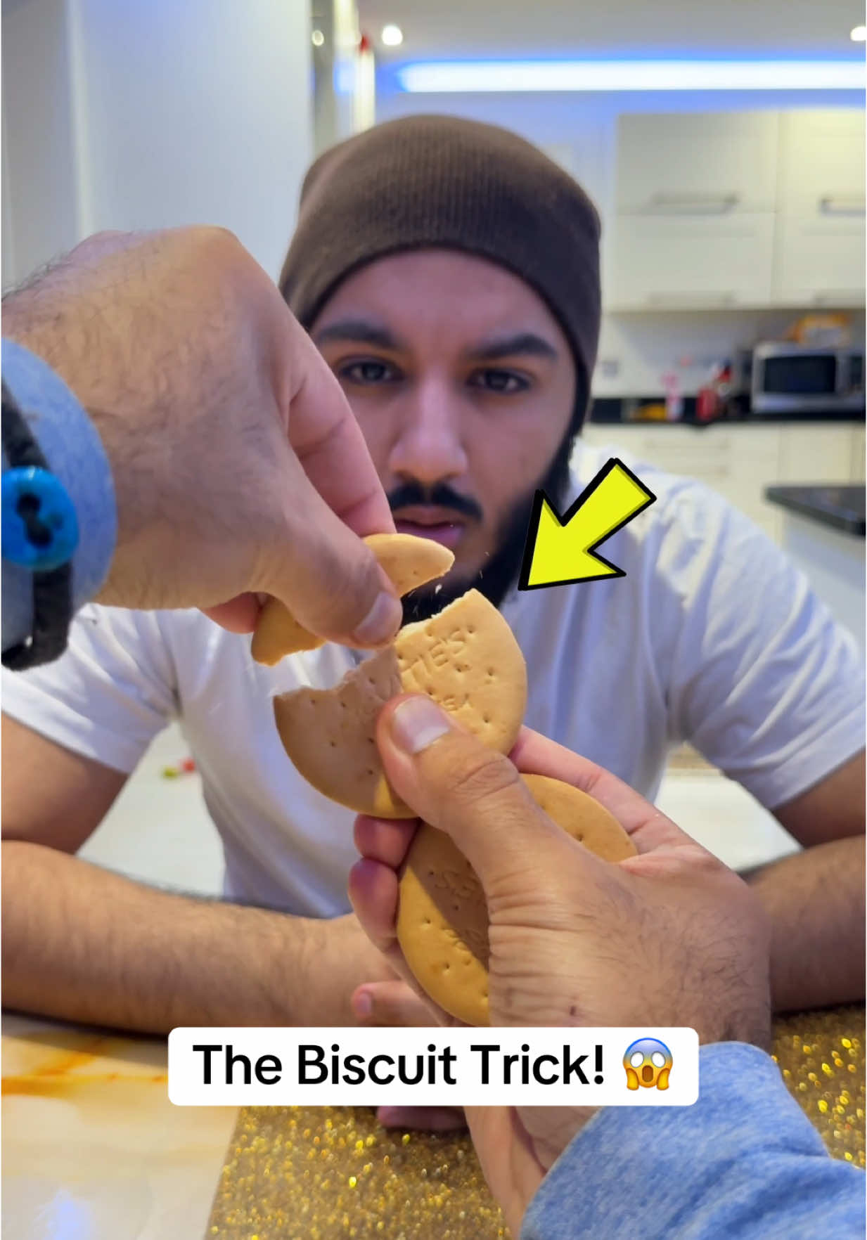 A post by @arshsoni on TikTok caption: The Broken Biscuit Trick (BTS) 😱🤯 Follow for more! ✨ #magic #trick #wow #how #viral #bts 
