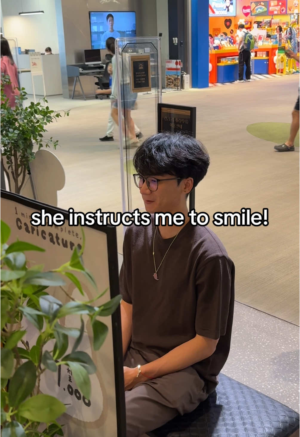 A post by @tuonto on TikTok caption: getting my portrait drawn by an artist in korea! #tuonto #korea #artist 