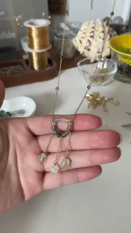 A post by @likayjewel_diylilylin on TikTok caption: Moss agate circle with prehnite drops necklace 🌿🌱🌵🍀💚✨🌳#handmadejewelry #necklace #necklacemaking #green #handmadenecklace #necklacestack #tutorial #foru #summer #summerjewelry #jewellery 