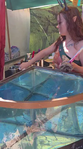 A post by @sher_leas on TikTok caption: first dragon Candle of the season. Oregon Renaissance Faire in Canby Oregon. Come see us! #faire #renaissance #festival #fun #fairefun #dragon #DRAGON #yay #candle #magic #fairy #costumes ##renaissancefaire 
