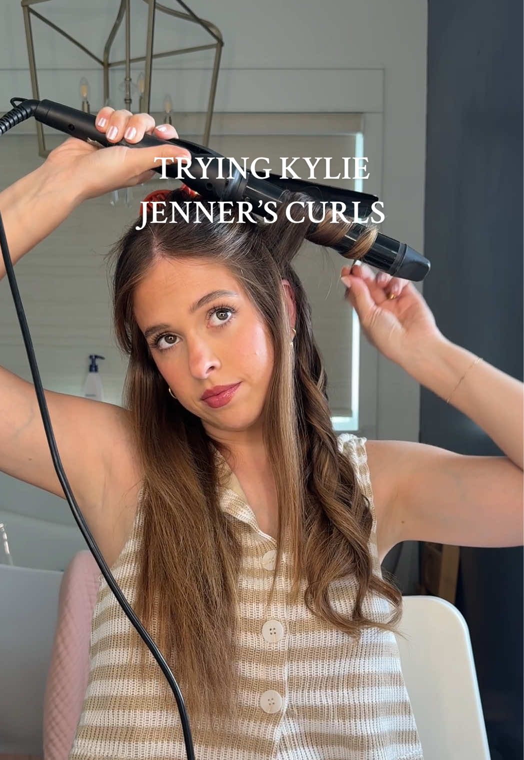A post by @iamkelianne on TikTok caption: Attempting the tutorial lol #hair #kyliejennerhair #haircurling 