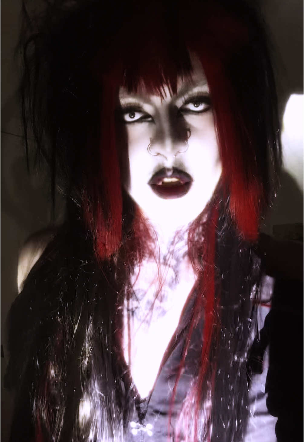 A post by @chaotix.cosplay on TikTok caption: I’m still sitting w this album, trust🥹 #drag #goth #alternative #gothdrag 
