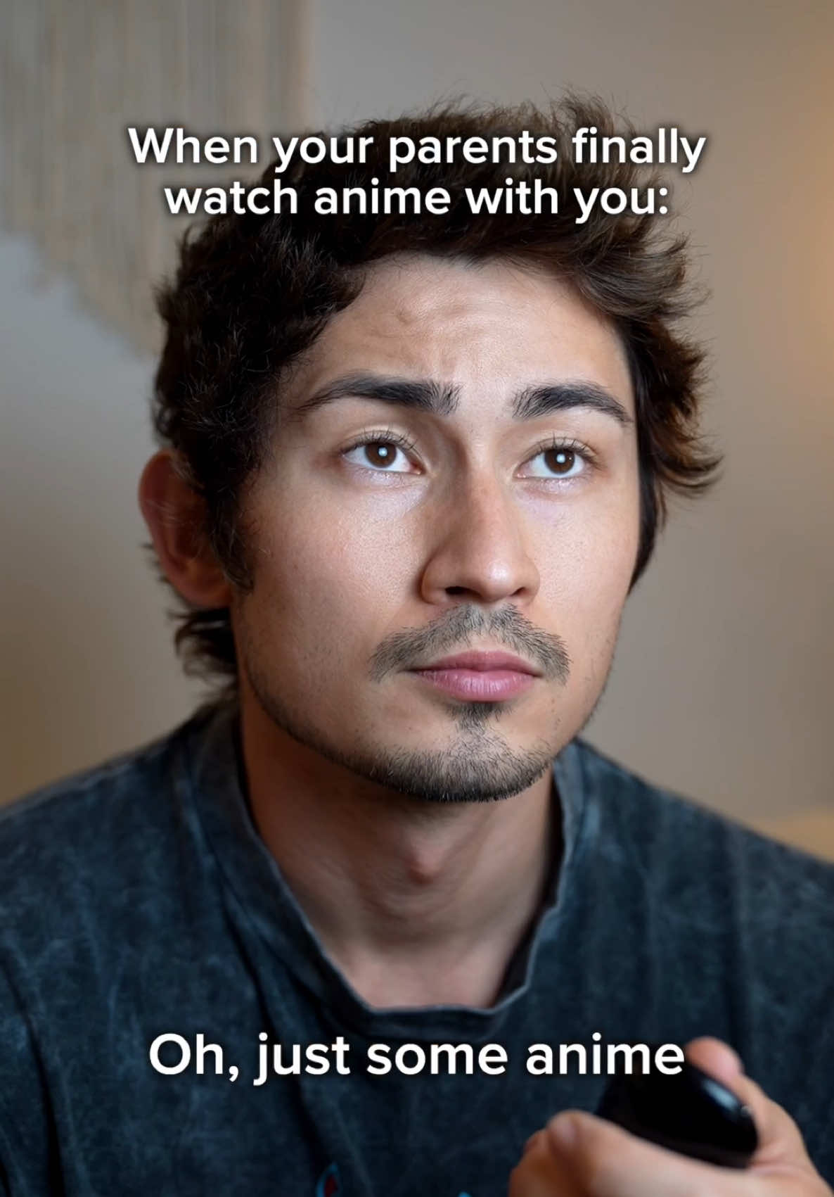 A post by @ianboggs on TikTok caption: When your parents finally want to watch anime with you 😂 #anime 
