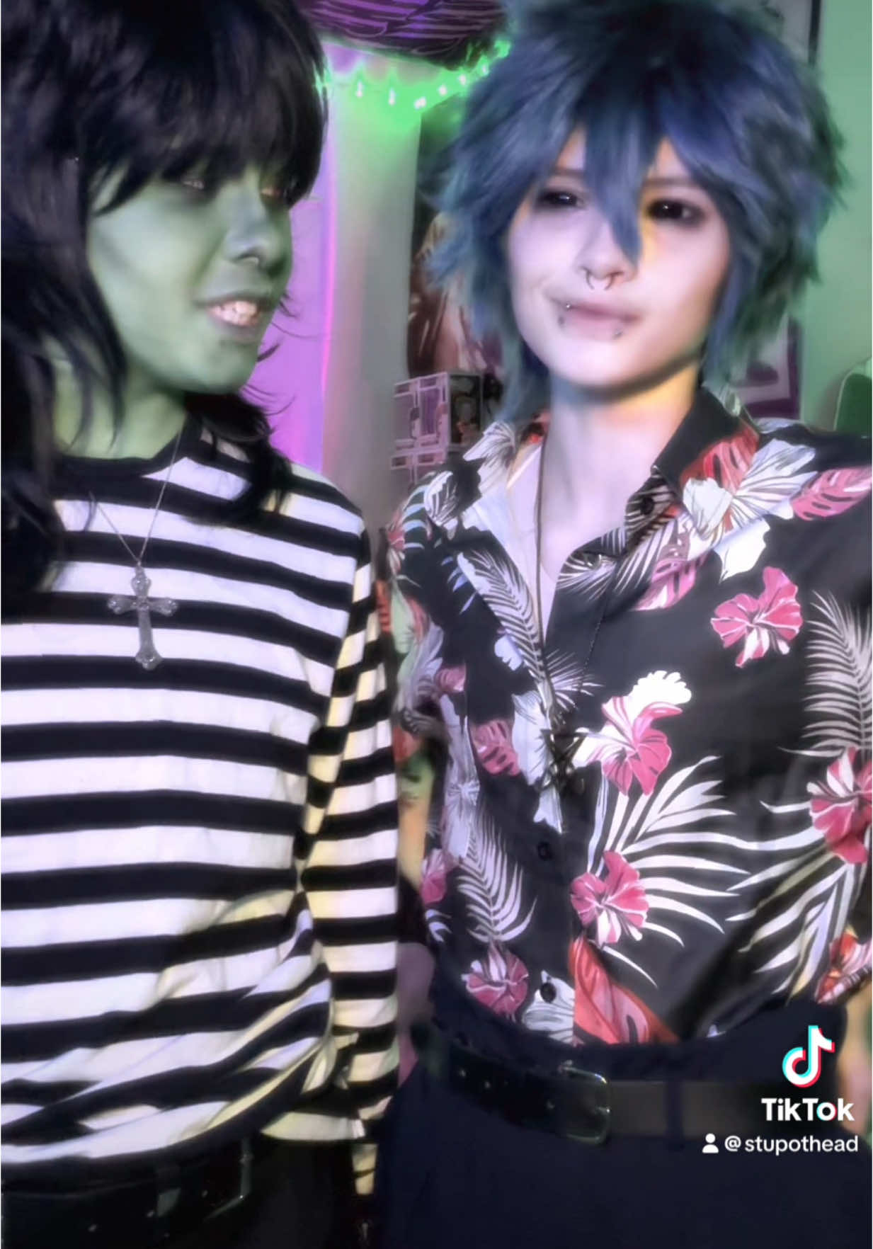 A post by @stupothead on TikTok caption: Tapes frough the post :] // Posting again since TikTok decided to take my other video down EUGH 💔 Happy pride month, and happy late birthday to Murdoc 🗣️🗣️🗣️🗣️  @Ollie |-/ #cosplay #gorillaz #gorillazcosplay #2dgorillaz #gorillaz2d #2dgorillazcosplay #stuartpot #2dcosplay #murdoc #murdocniccals #murdocgorillaz #murdoccosplay #ifarted #YIPPIE 