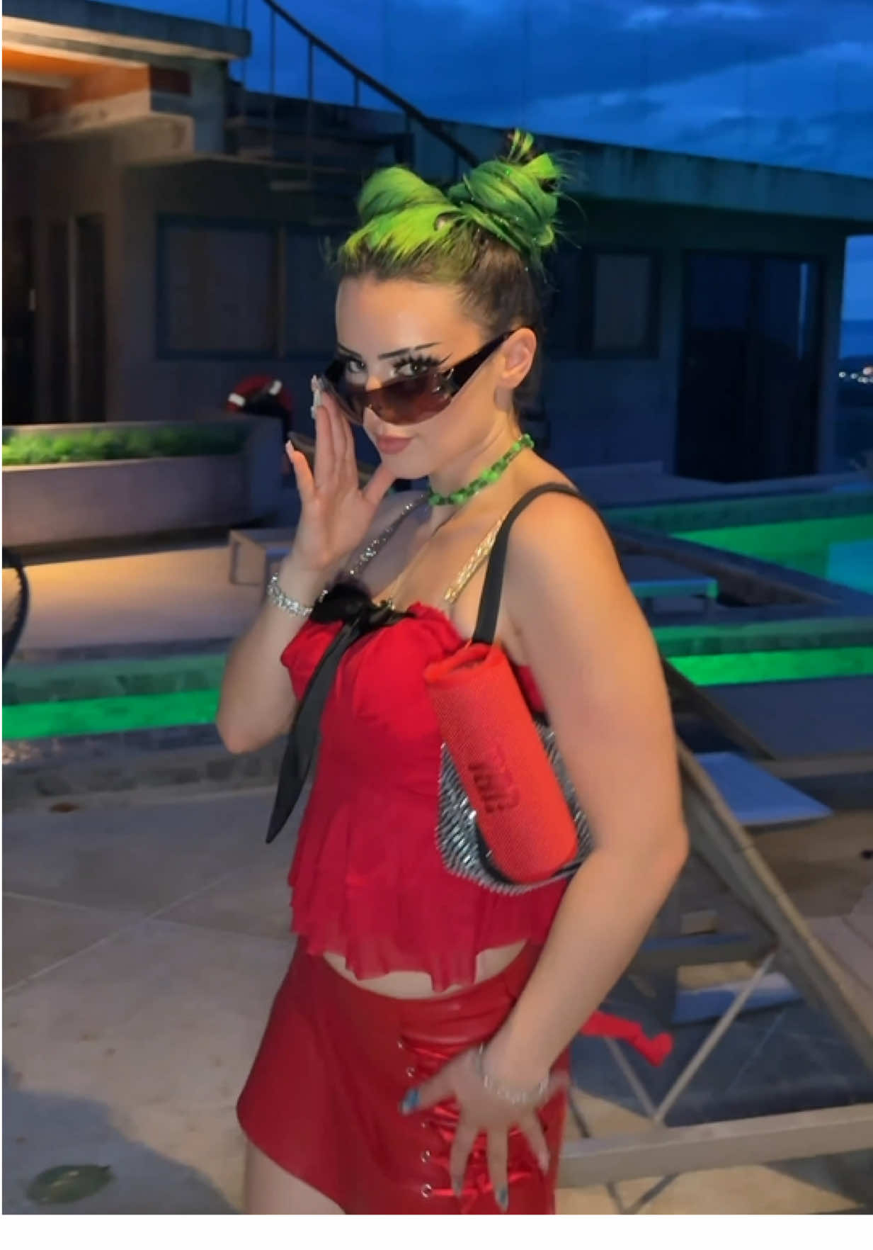 A post by @di1araa.s on TikTok caption: Anzeige / Which outfit/JBL Combo do you think match the most 🥹💚@JBLeurope #JBLFlip7 #JBLCharge6 
