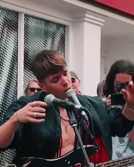 A post by @renmakesmusic on TikTok caption: busking in brighton a little while ago! #renmakesmusic #sickboi #busking #singer #soul #blues