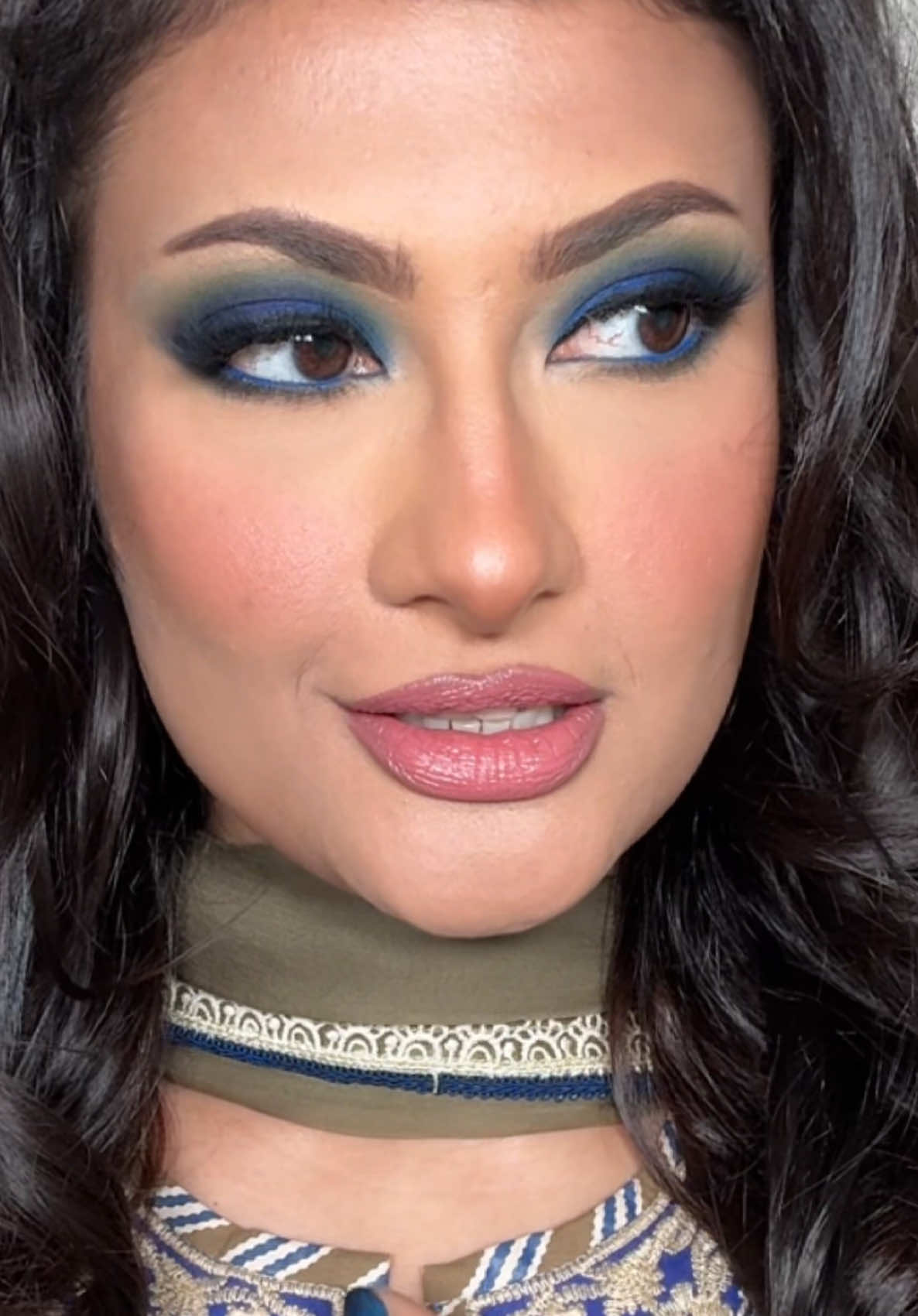 A post by @faizamakeupartistry on TikTok caption: Love this song! #lipsync #smokeyeyes #glammakeup 
