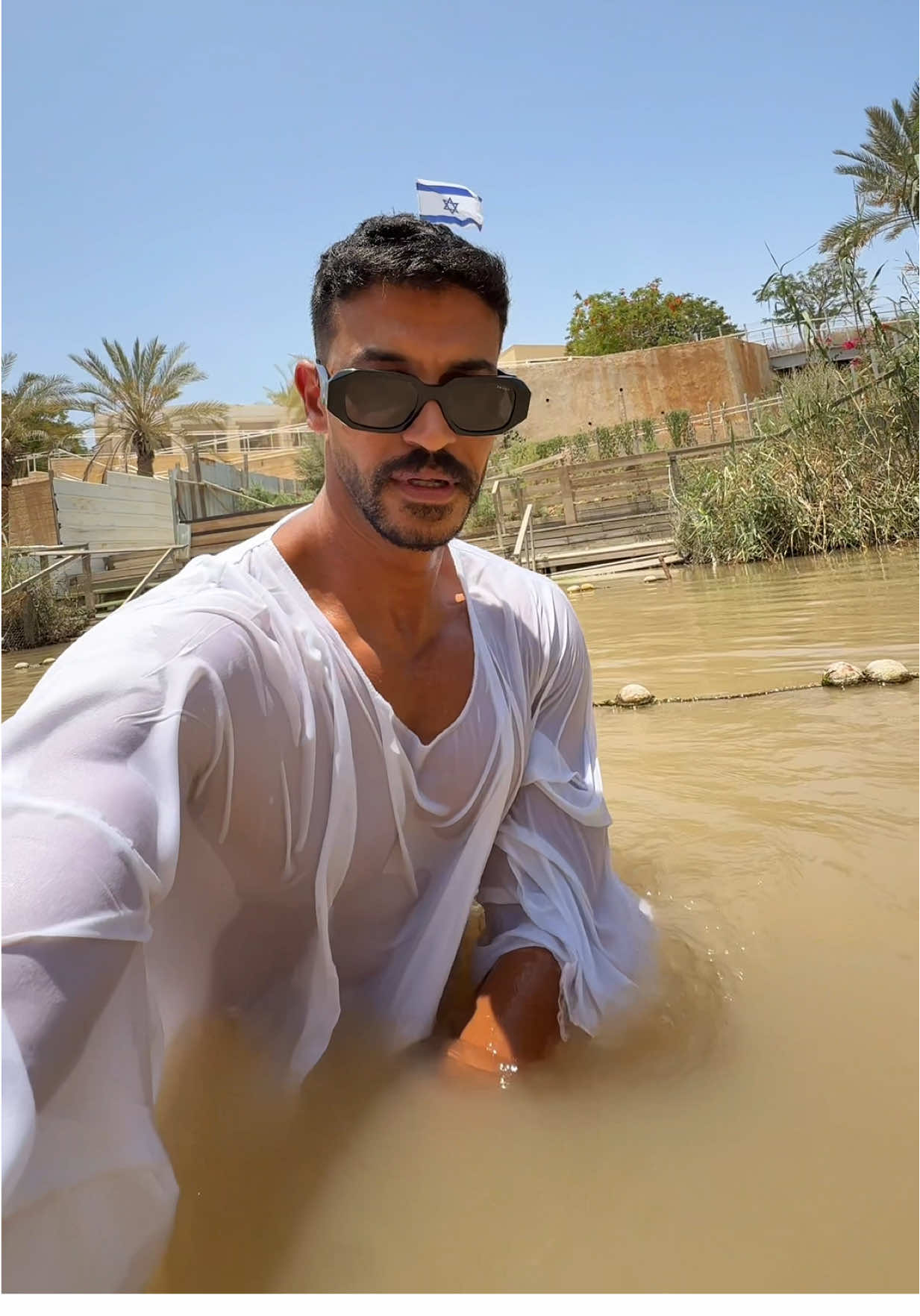 A post by @taha.asaad on TikTok caption: هل يجوز للمسلم ان يتعمّد بنهر الاردن 🇯🇴!!!  #tahaasaad #lifestyle #viral #explore #tiktok #fyp #jordan 