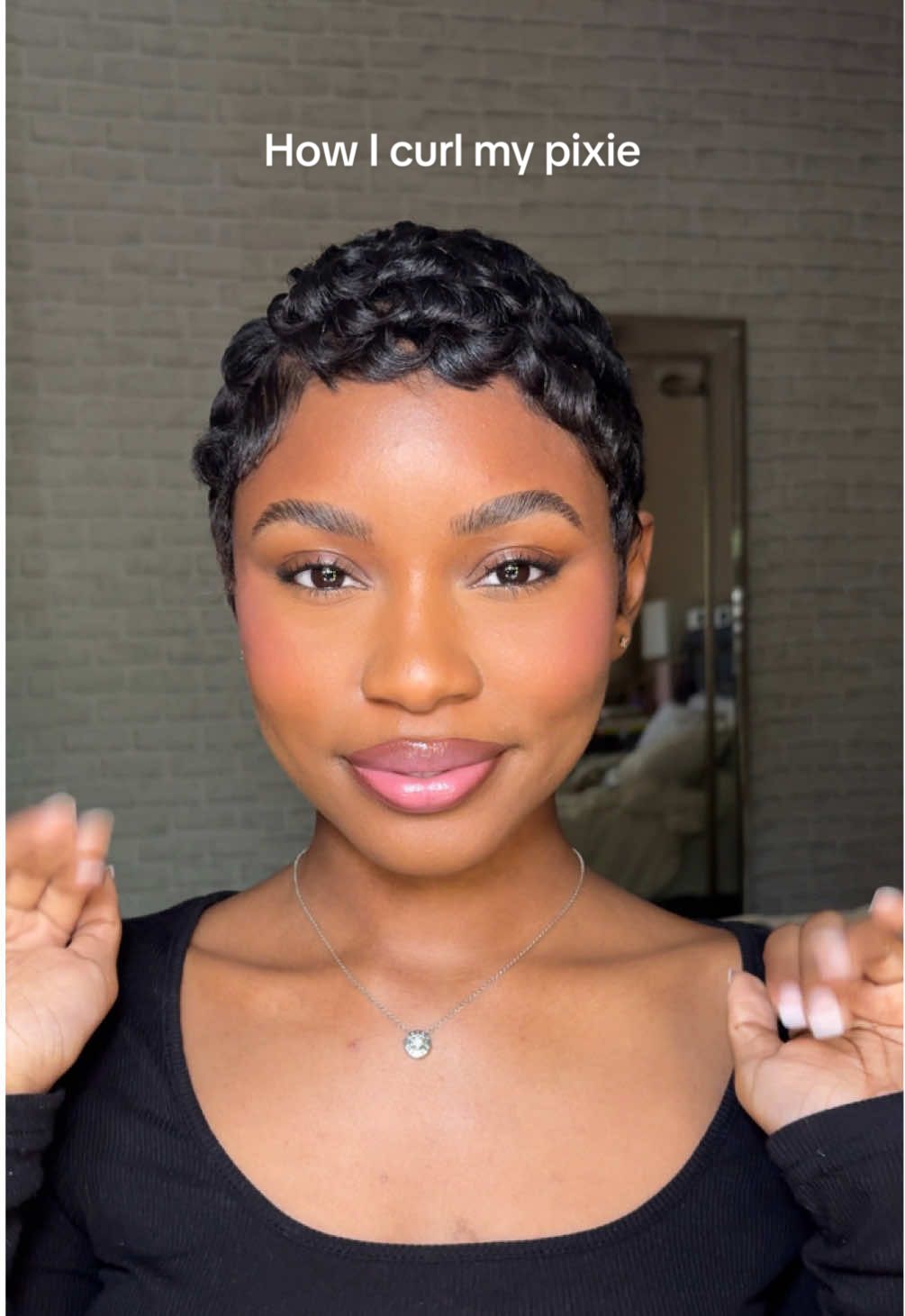 A post by @jasorjas on TikTok caption: Finally dropping the highly requested pixie tutorial! Let’s get into how I style & curl my pixie! 🥰  #pixiecut #pixiehaircut #blackgirlpixiecut #pixiecutblackwomen #shorthair #pixiecuthairstyle #stylemyhairwithme #pixiecurls 