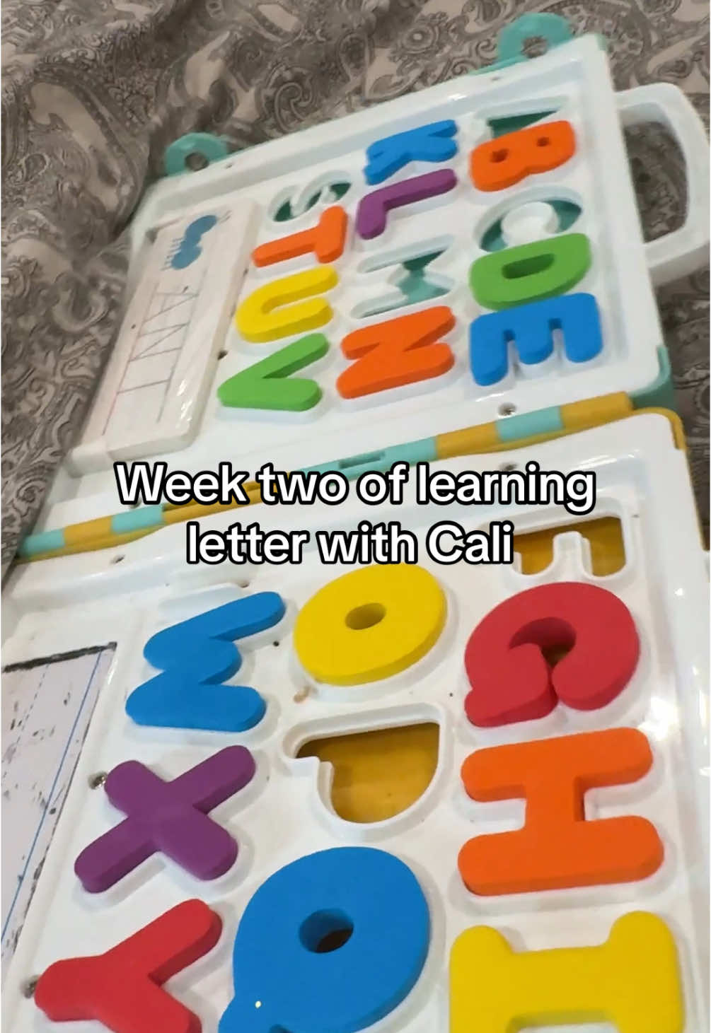 A post by @callmeeeprincess on TikTok caption: We're making some progress but I still don't know how to get her to recognize every letter not just associate words with them #fyp #calilove #toddlersoftiktok 