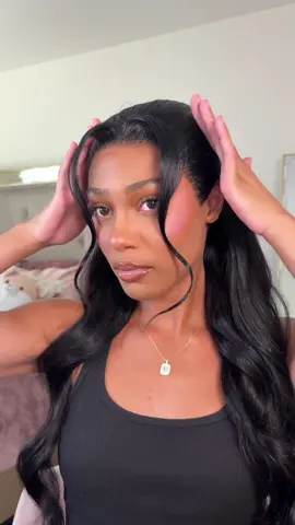 A post by @ on TikTok caption: cute half up half down style 🥰 @JMSTJMST hair #hdlacewig #ttshop #tiktokshopwig #fyp #wiginstall #lacefrontwig 